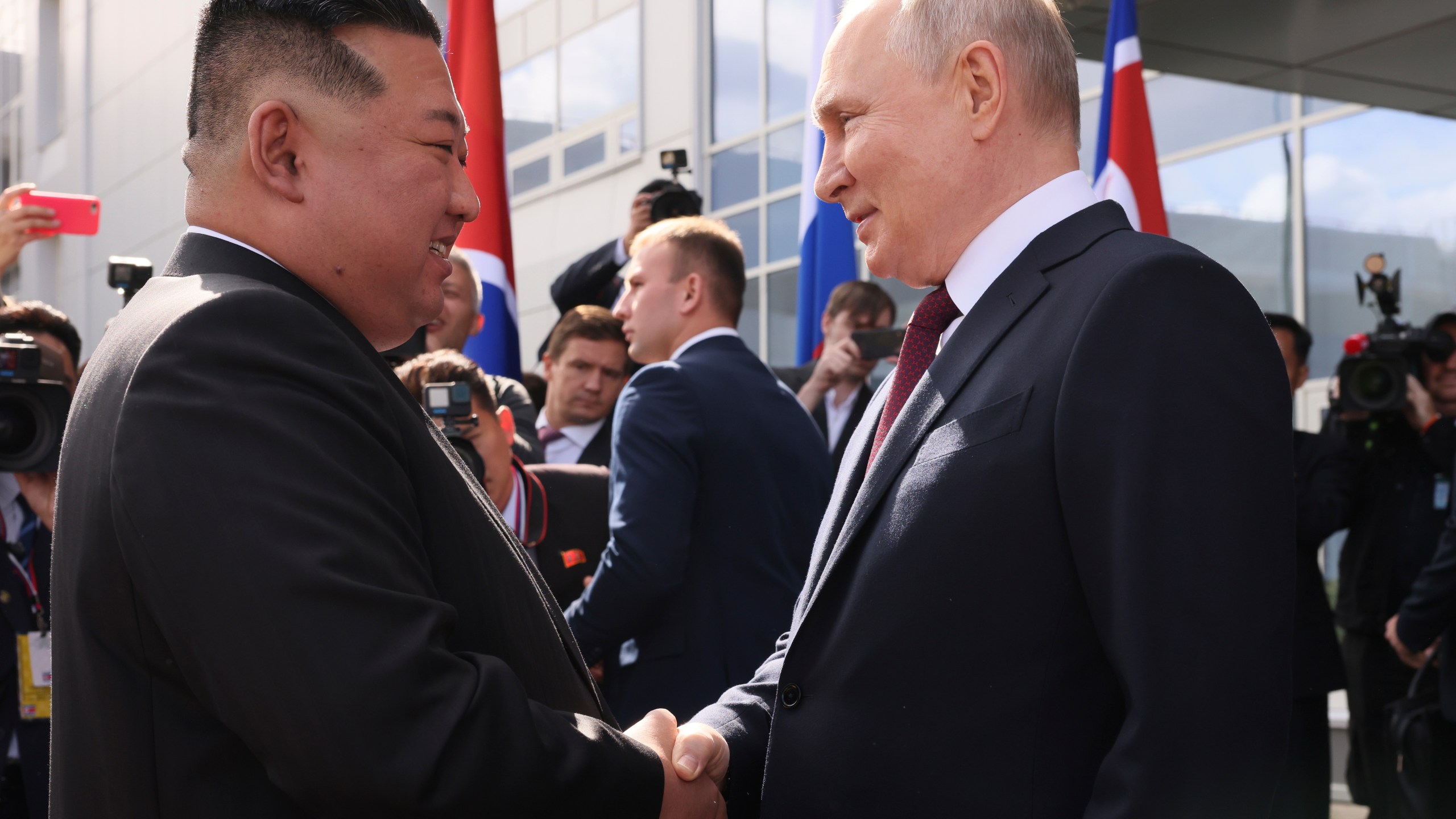 Russian President Vladimir Putin, right, and North Korea's leader Kim Jong Un shake hands during their meeting at the Vostochny cosmodrome outside the city of Tsiolkovsky, about 200 kilometers (125 miles) from the city of Blagoveshchensk in the far eastern Amur region, Russia, on Wednesday, Sept. 13, 2023. (Mikhail Metzel, Sputnik, Kremlin Pool Photo via AP)