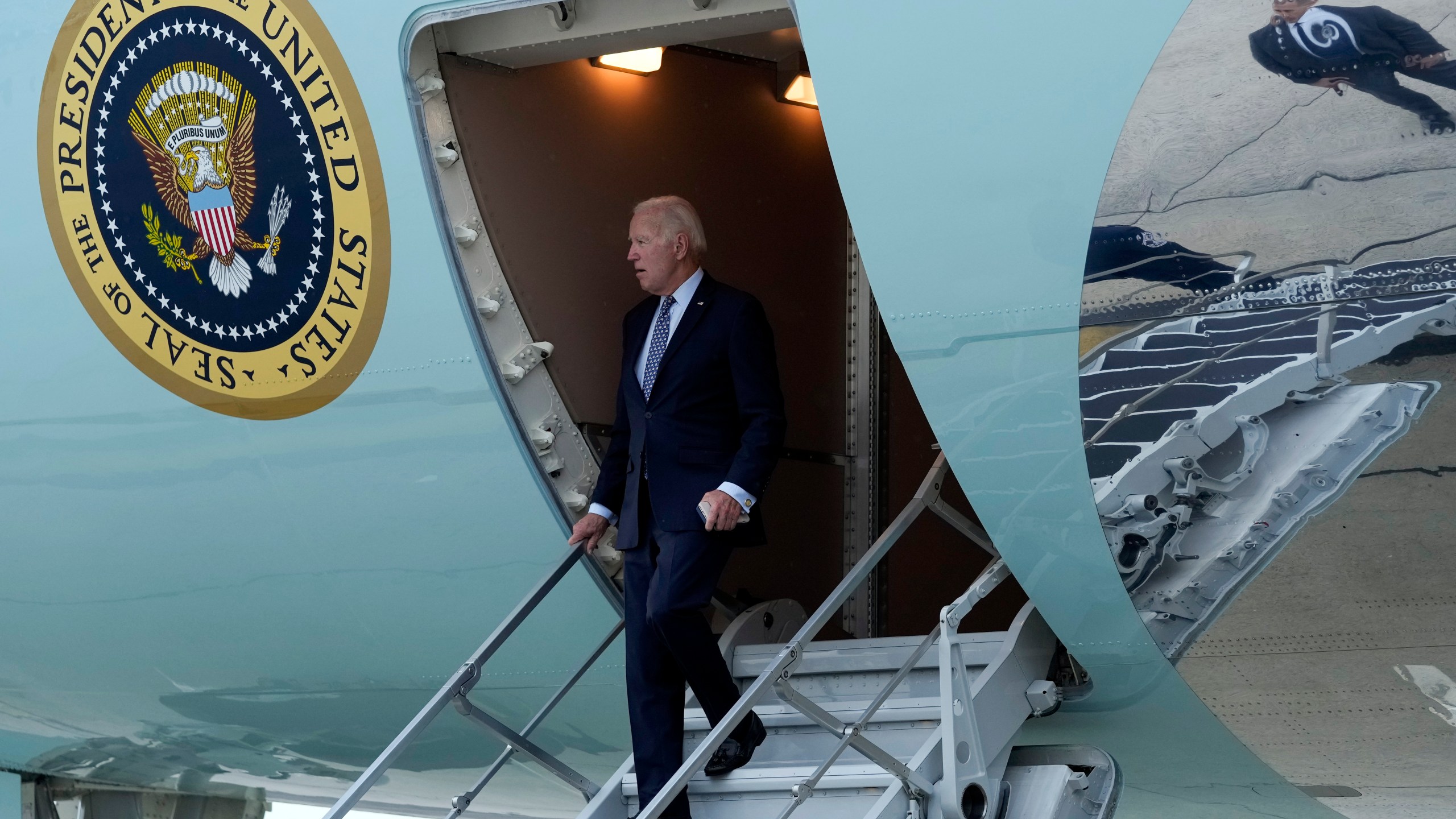 FILE - President Joe Biden walks down the steps of Air Force One at John F. Kennedy International Airport in New York, Sept. 17, 2023. Biden is in New York to attend the United Nations General Assembly and fundraisers. (AP Photo/Susan Walsh, File)