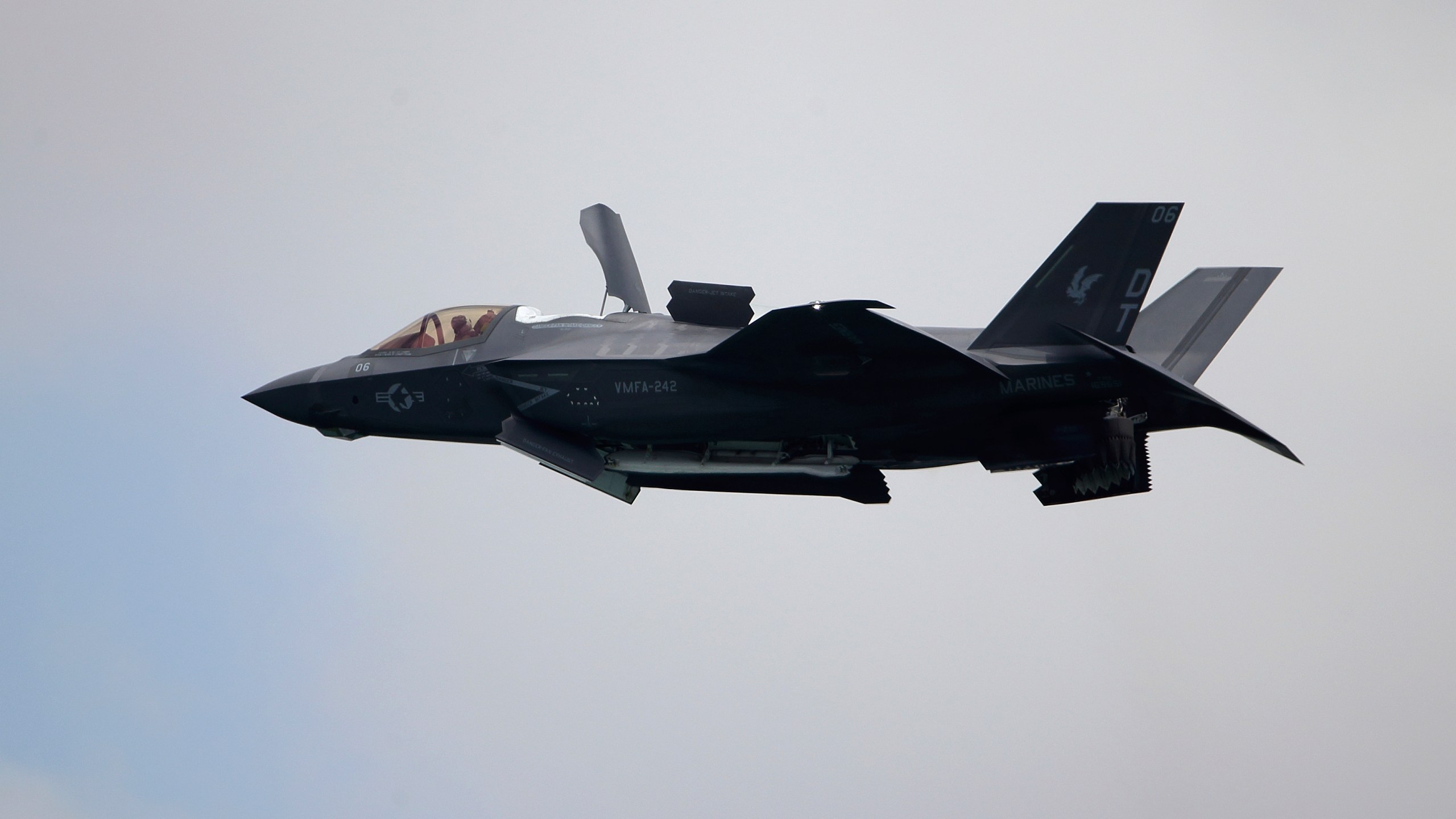 FILE - A United States Marine Corps F-35B Lightning II takes part in an aerial display during the Singapore Airshow 2022 at Changi Exhibition Centre in Singapore, Feb. 15, 2022. A Marine Corps pilot safely ejected from a fighter jet over South Carolina and the search for his missing aircraft was focused on two lakes near North Charleston. Military officials say the pilot parachuted safely into a North Charleston neighborhood Sunday Sept. 17, 2023. He was taken to a hospital and was in stable condition. The pilot's name has not been released. A search for the missing F-35 was focused on Lake Moultrie and Lake Marion, which are north of North Charleston. (AP Photo/Suhaimi Abdullah file)