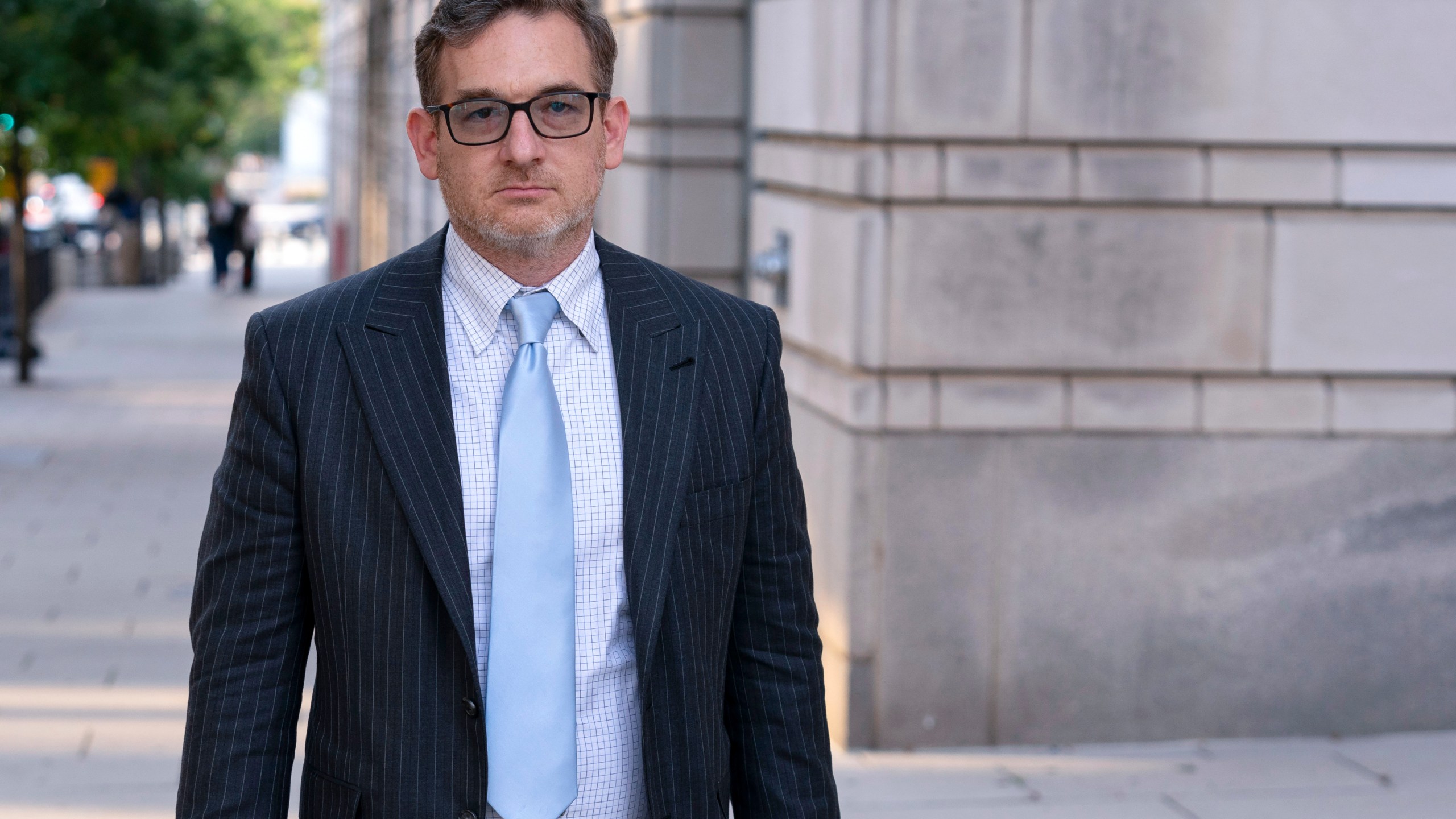 DuckDuckGo founder and CEO Gabriel Weinberg walks from the U.S. Federal Courthouse, Thursday, Sept. 21, 2023 in Washington. Weinberg testified Thursday that Google's deals with phone companies and equipment manufacturers make it hard for his company to compete. (AP Photo/Jose Luis Magana)