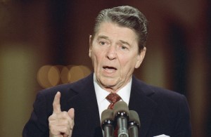 FILE - President Ronald Reagan speaks during a news conference in the East Room of the White House, Dec. 8, 1988, in Washington. As most Republican White House hopefuls gather Wednesday at Reagan’s presidential library for a debate, expect to hear more homages to the “Great Communicator.” (AP Photo/Doug Mills, File)