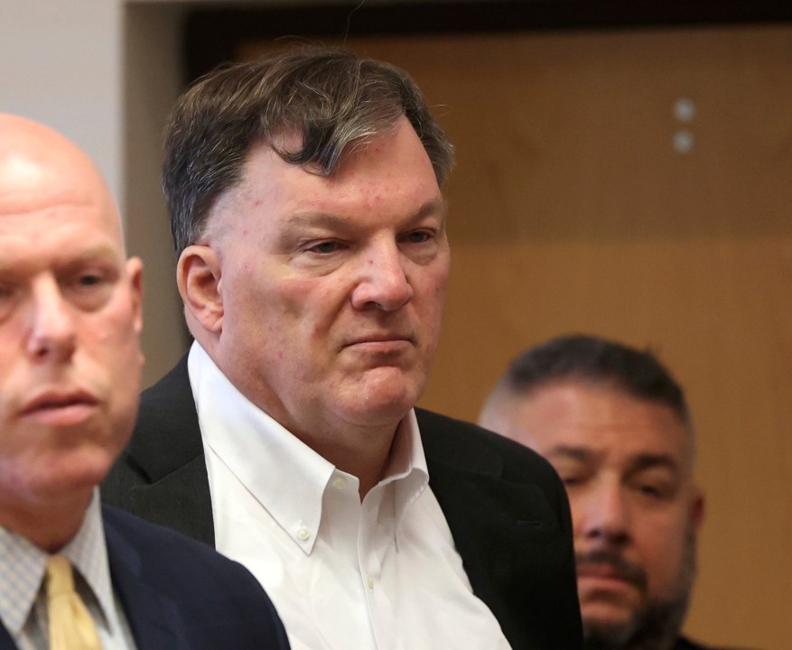 Rex Heuermann appears with his lawyer Michael J. Brown, left, at Suffolk County Court in Riverhead, N.Y., on Wednesday, Sept. 27, 2023. Heuermann was charged last month in the deaths of three women and is the prime suspect in a fourth. (James Carbone /Newsday via AP)