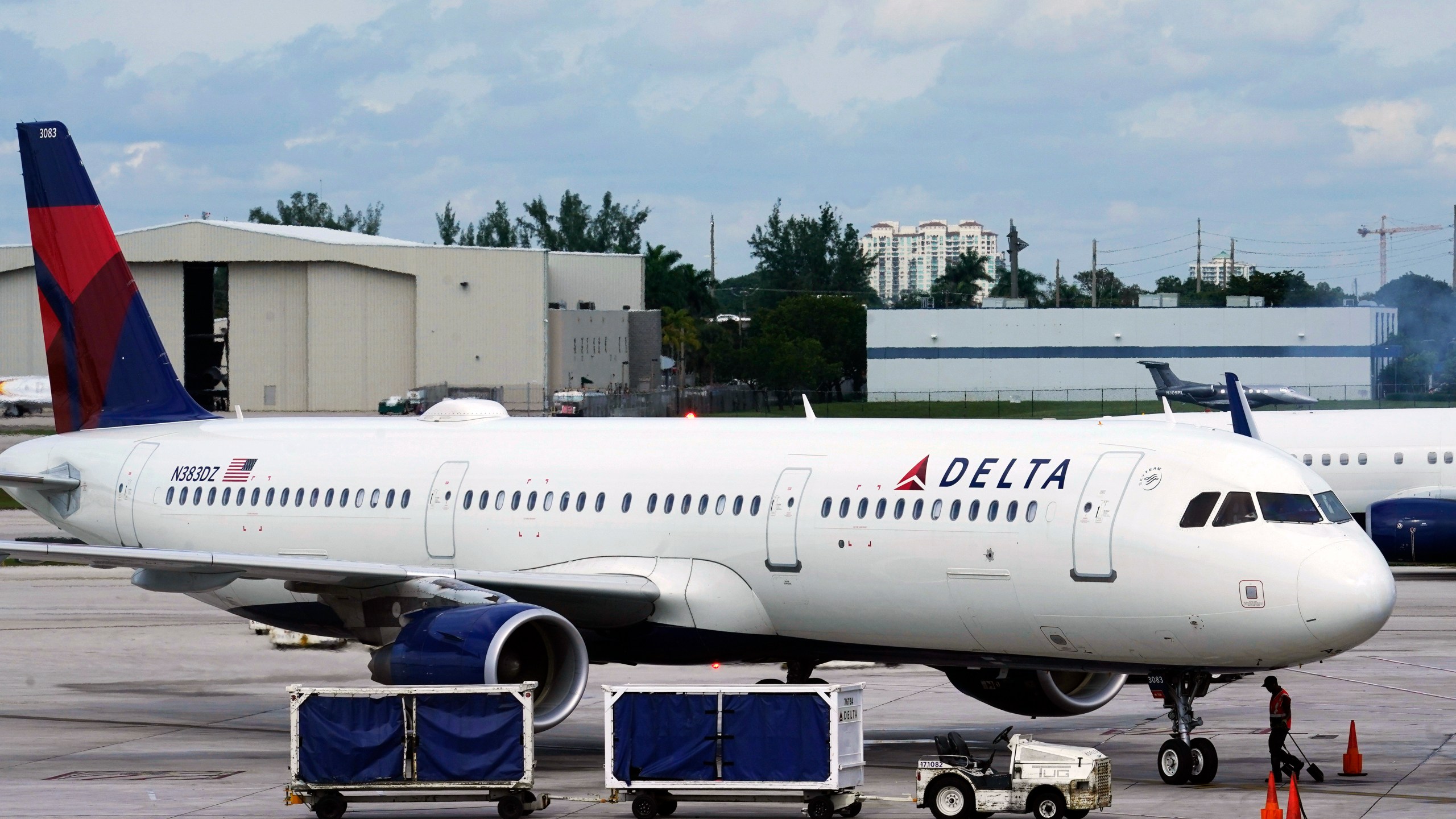 A Delta Air Lines jet arrives at Fort Lauderdale-Hollywood International Airport, Thursday, Dec. 22, 2022, in Fort Lauderdale, Fla. (AP Photo/Marta Lavandier)