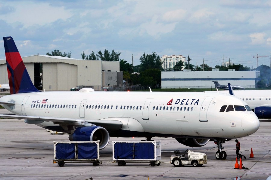 A Delta Air Lines jet arrives at Fort Lauderdale-Hollywood International Airport, Thursday, Dec. 22, 2022, in Fort Lauderdale, Fla. (AP Photo/Marta Lavandier)