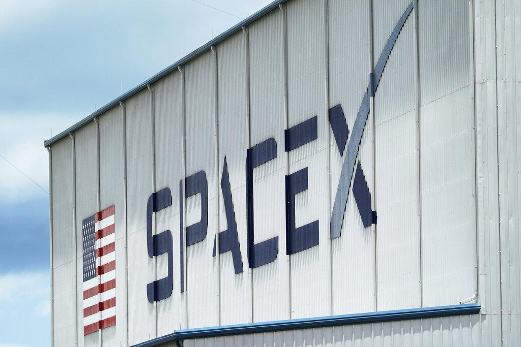 Logo of SpaceX displayed on a building.