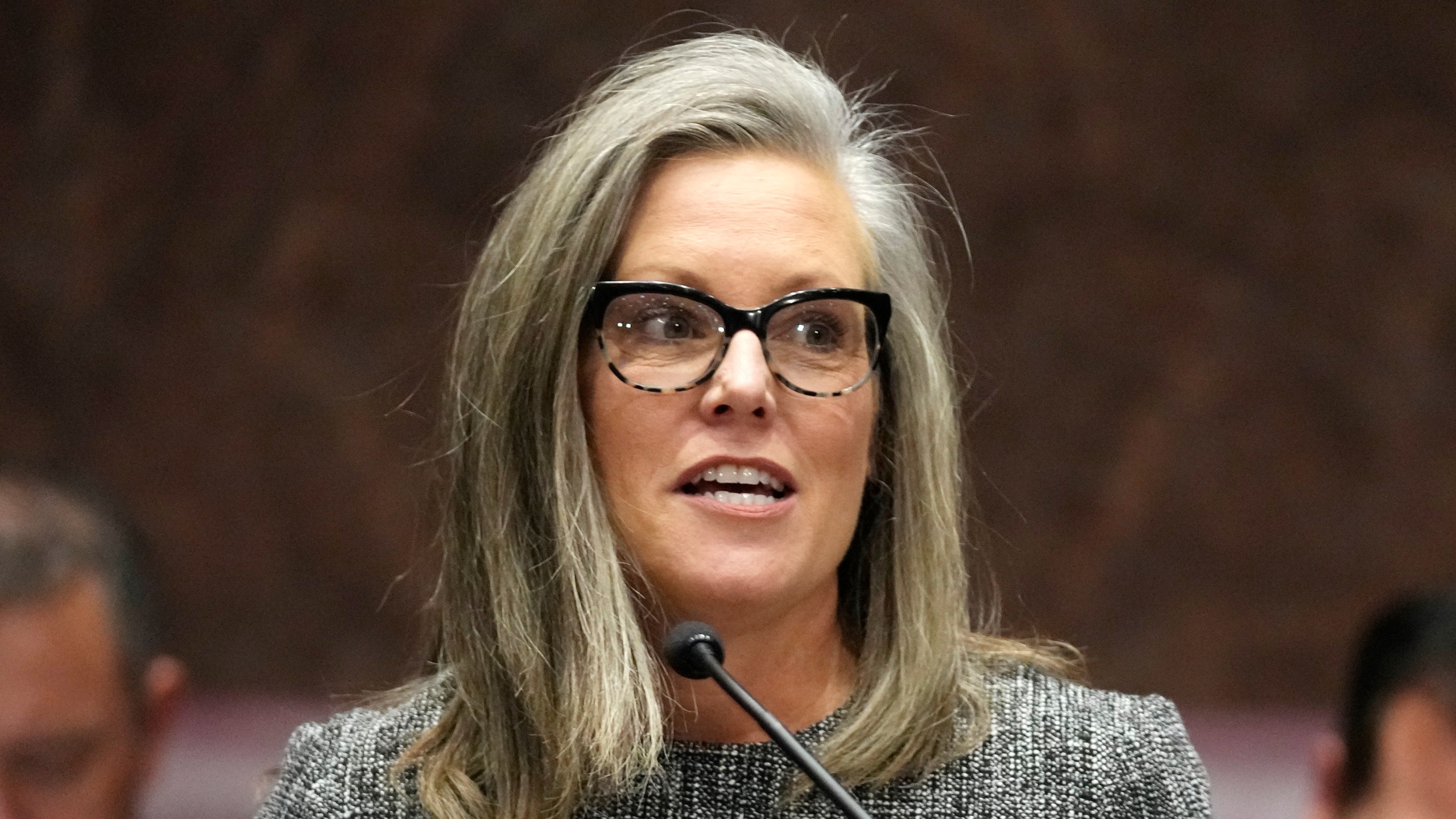 FILE - Arizona Democratic Gov. Katie Hobbs speaks as she gives the State of the State address, Jan. 9, 2023, at the Arizona Capitol in Phoenix. Hobbs said her administration was terminating land leases that for years have given a Saudi-owned farm nearly unfettered access to pump groundwater in the parched southwestern state. (AP Photo/Ross D. Franklin, File)