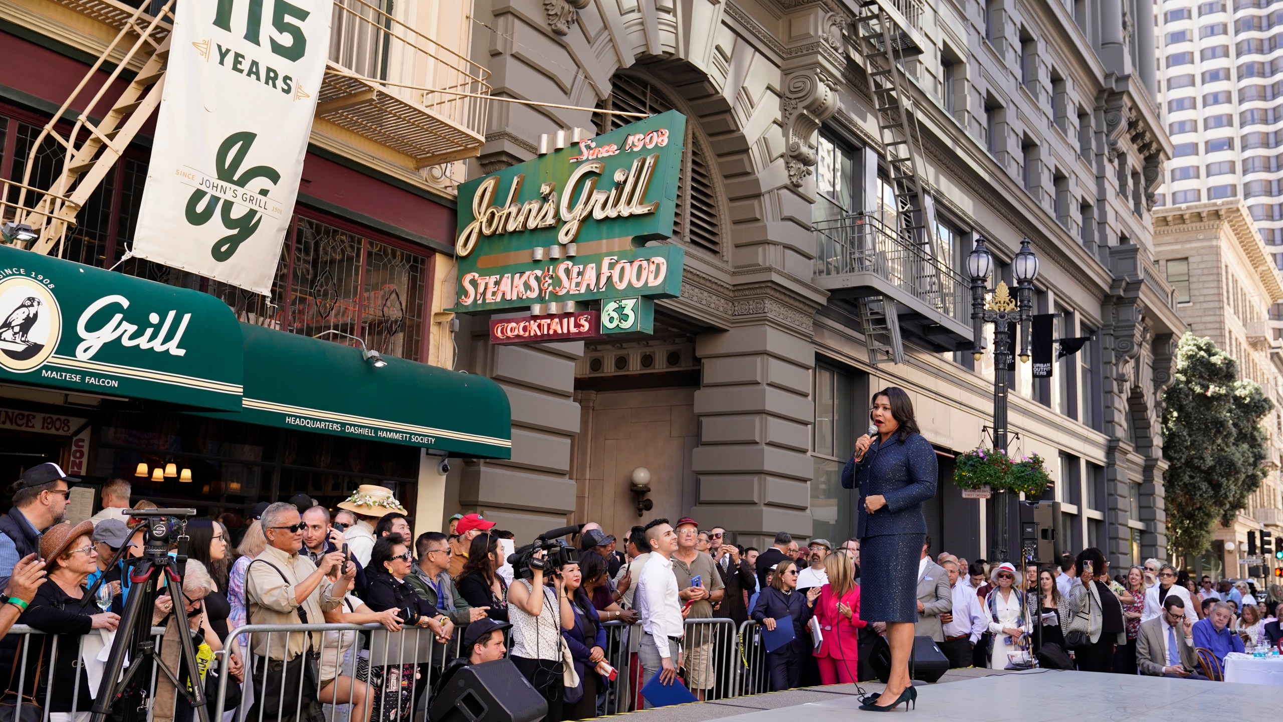 San Francisco Mayor London Breed pays tribute to the late Sen. Dianne Feinstein outside John's Grill in San Francisco, Wednesday, Oct. 4, 2023. The restaurant, which celebrated its 115th anniversary Wednesday with a free lunch and appearances by the mayor and other politicians, paid tribute to Sen. Feinstein who died last week. (AP Photo/Eric Risberg)