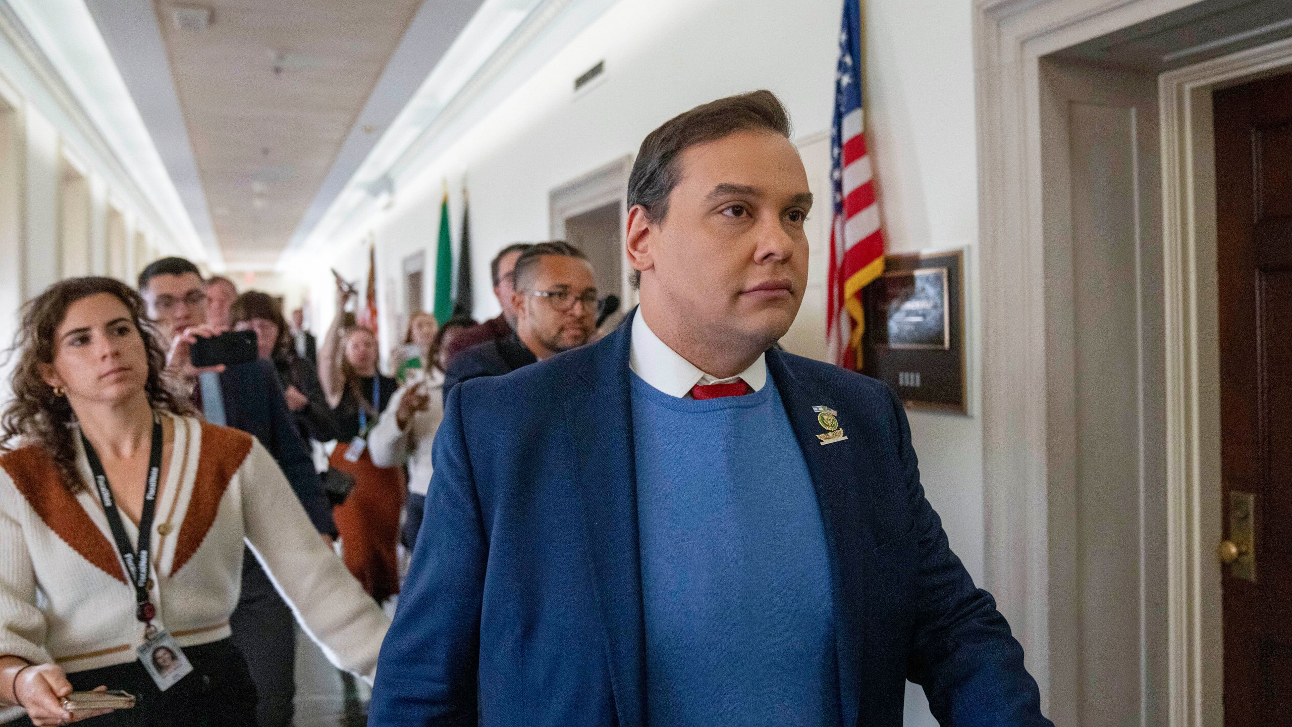 Rep. George Santos, R-N.Y., departs a House Republican closed-door caucus to decide who to nominate for speaker of the House, on Capitol Hill, Wednesday, Oct. 11, 2023, in Washington. (AP Photo/Alex Brandon)