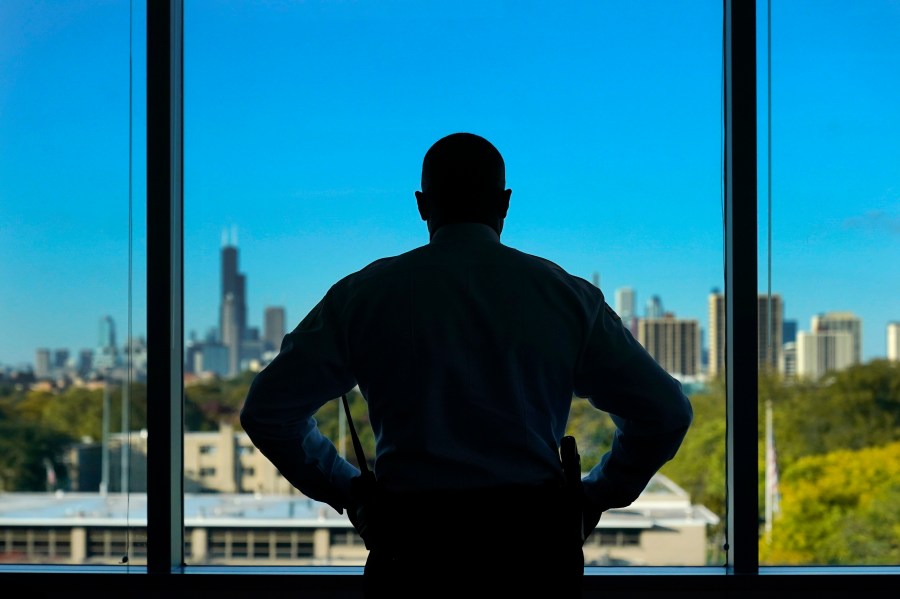 Chicago Police Superintendent Larry Snelling stands for a portrait at his office over looking the city's skyline after an interview with The Associated Press Tuesday, Oct. 17, 2023, in Chicago. Snelling says the city’s use of police stations as temporary housing for the growing population of migrants seeking asylum has been a "burden" on the nation’s second-largest police department. More than 18,500 migrants have arrived in Chicago since last year. (AP Photo/Charles Rex Arbogast)