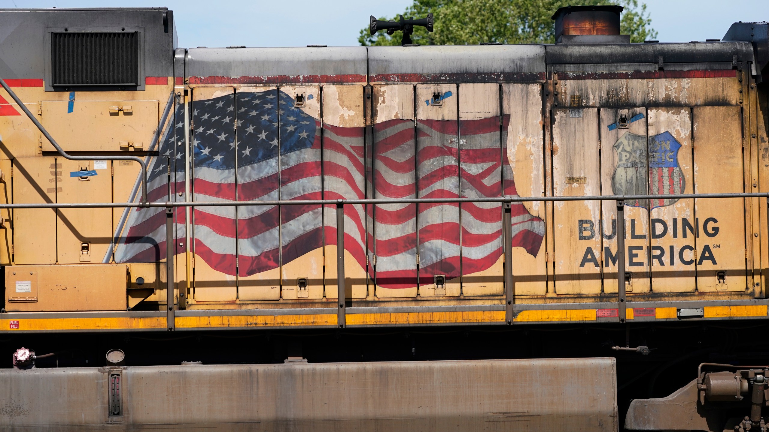 FILE - An American flag is emblazoned on this Union Pacific Railroad locomotive sitting in the Jackson, Miss., terminal rail yard, Wednesday, April 20, 2022. Union Pacific reports earnings on Thursday, Oct. 19, 2023. (AP Photo/Rogelio V. Solis, File)