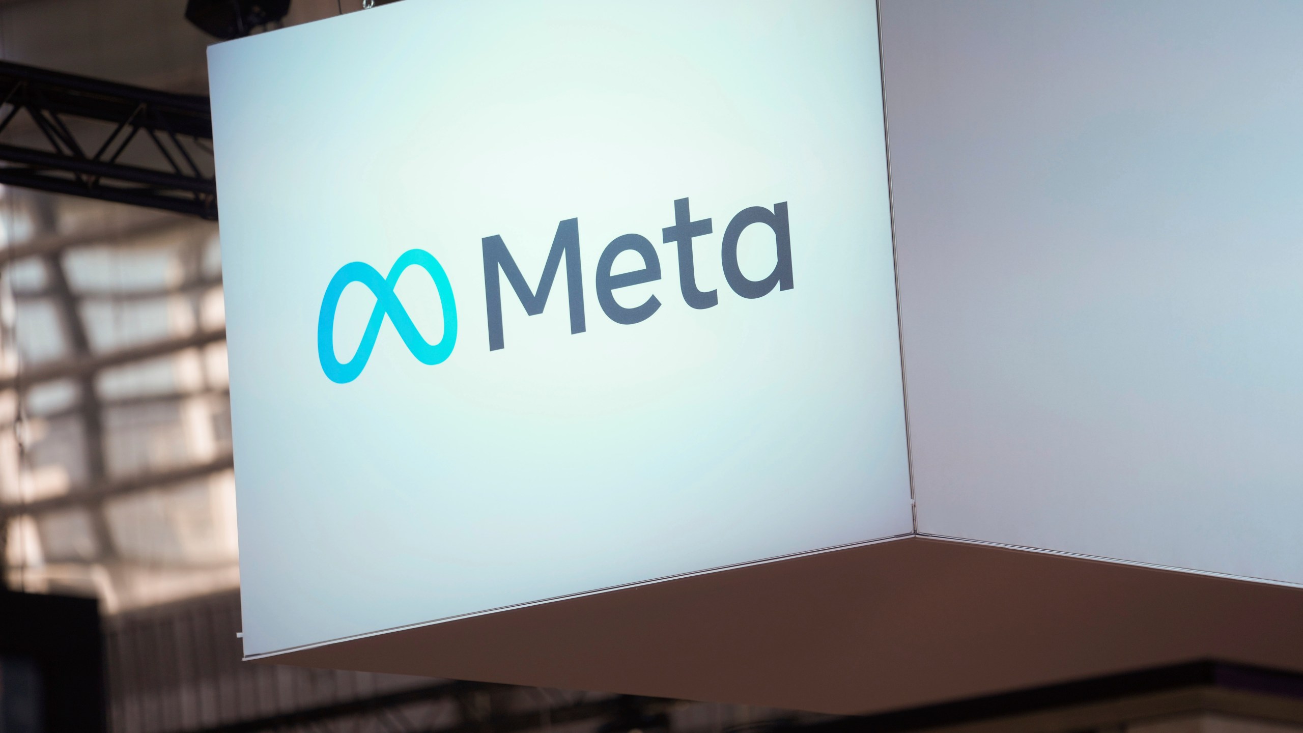 FILE - The Meta logo is seen at the Vivatech show in Paris, France, on June 14, 2023. A group of 33 states including California and New York are suing Meta Platforms Inc. for harming young people’s mental health and contributing the youth mental health crisis by knowingly designing features on Instagram and Facebook that addict children to its platforms. (AP Photo/Thibault Camus, File)