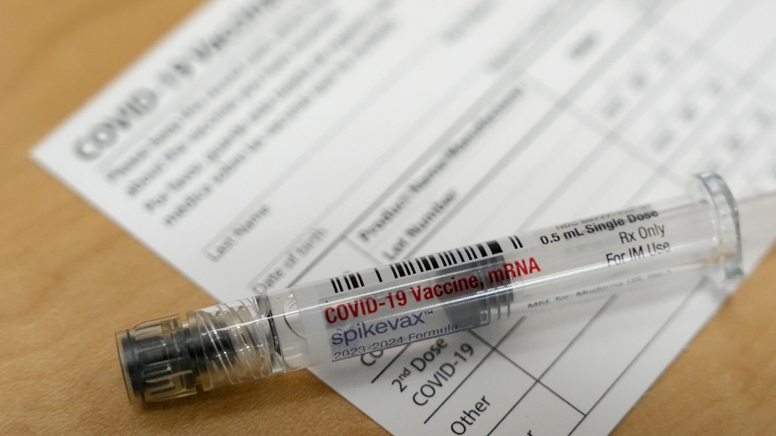 FILE - A Moderna Spikevax COVID-19 vaccine is seen at a drugstore in Cypress, Texas, Sept. 20, 2023. More than a month after federal officials recommended a new version of the COVID-19 vaccines, 7% of U.S. adults and 2% of children have gotten a shot. The numbers — which one expert called “abysmal” — were presented Thursday, Oct. 26, at a meeting held by the U.S. Centers for Disease Control and Prevention. (Melissa Phillip/Houston Chronicle via AP, File)