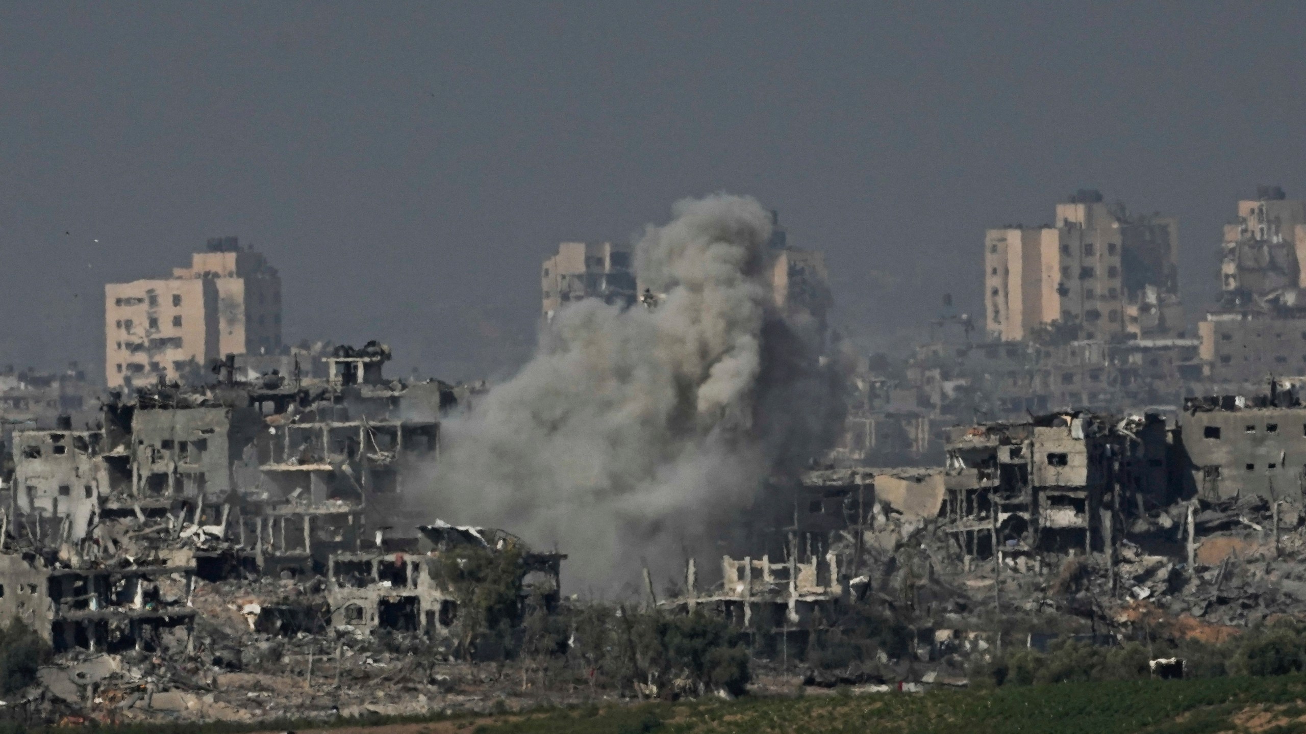 Smoke rises following an Israeli airstrike in the Gaza Strip, as seen from southern Israel, Tuesday, Oct. 31, 2023. (AP Photo/Ariel Schalit)