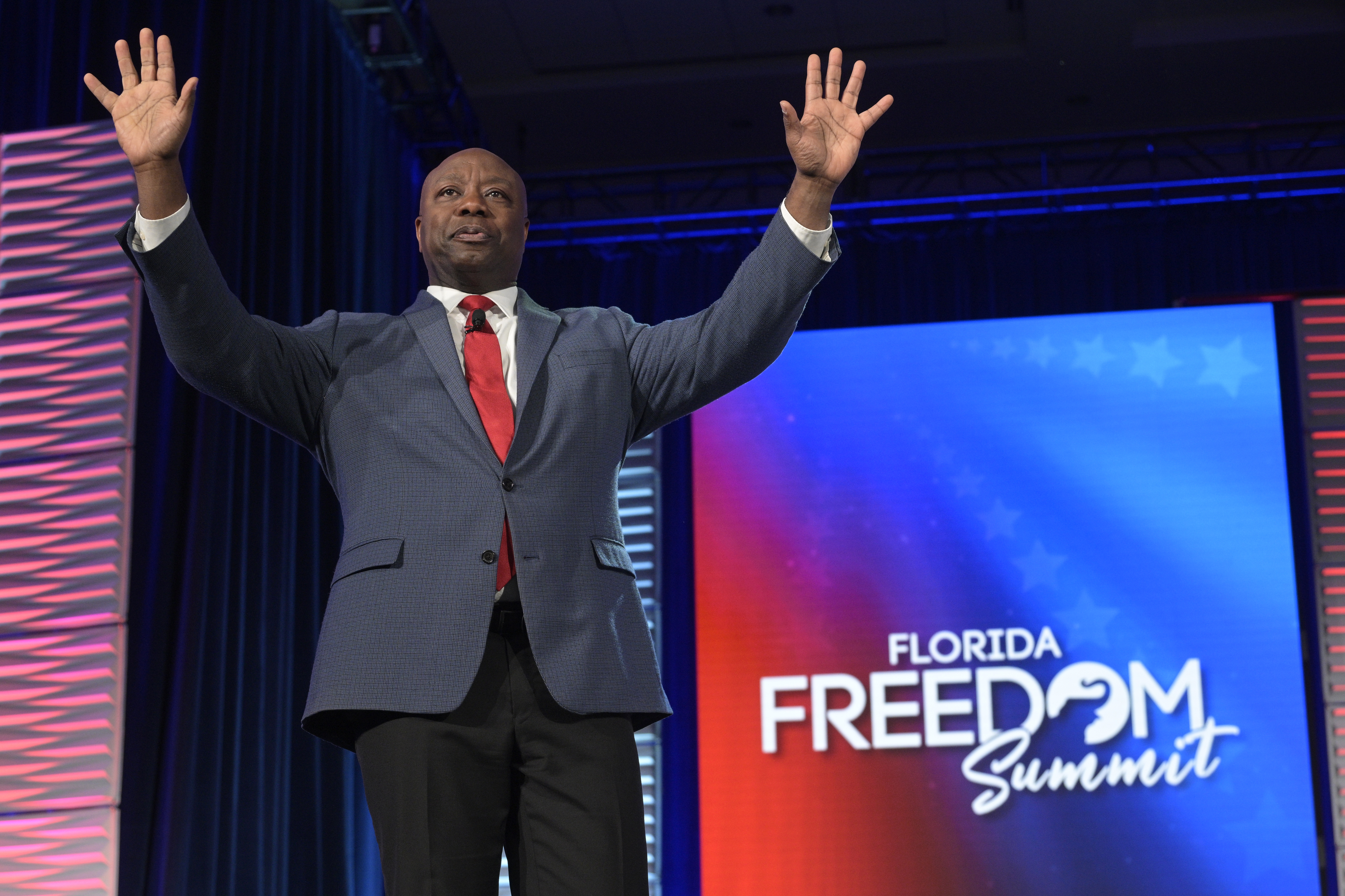 Republican presidential candidate Sen. Tim Scott, R-S.C., acknowledges attendees after speaking at the Republican Party of Florida Freedom Summit, Saturday, Nov. 4, 2023, in Kissimmee, Fla. (AP Photo/Phelan M. Ebenhack)