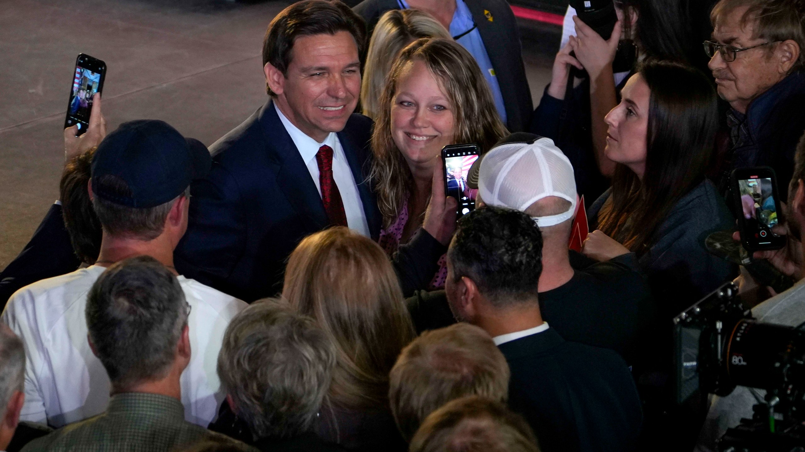 Republican presidential candidate Florida Gov. Ron DeSantis greets supporters after speaking during a rally with Iowa Gov. Kim Reynolds, Monday, Nov. 6, 2023, in Des Moines, Iowa. (AP Photo/Bryon Houlgrave)