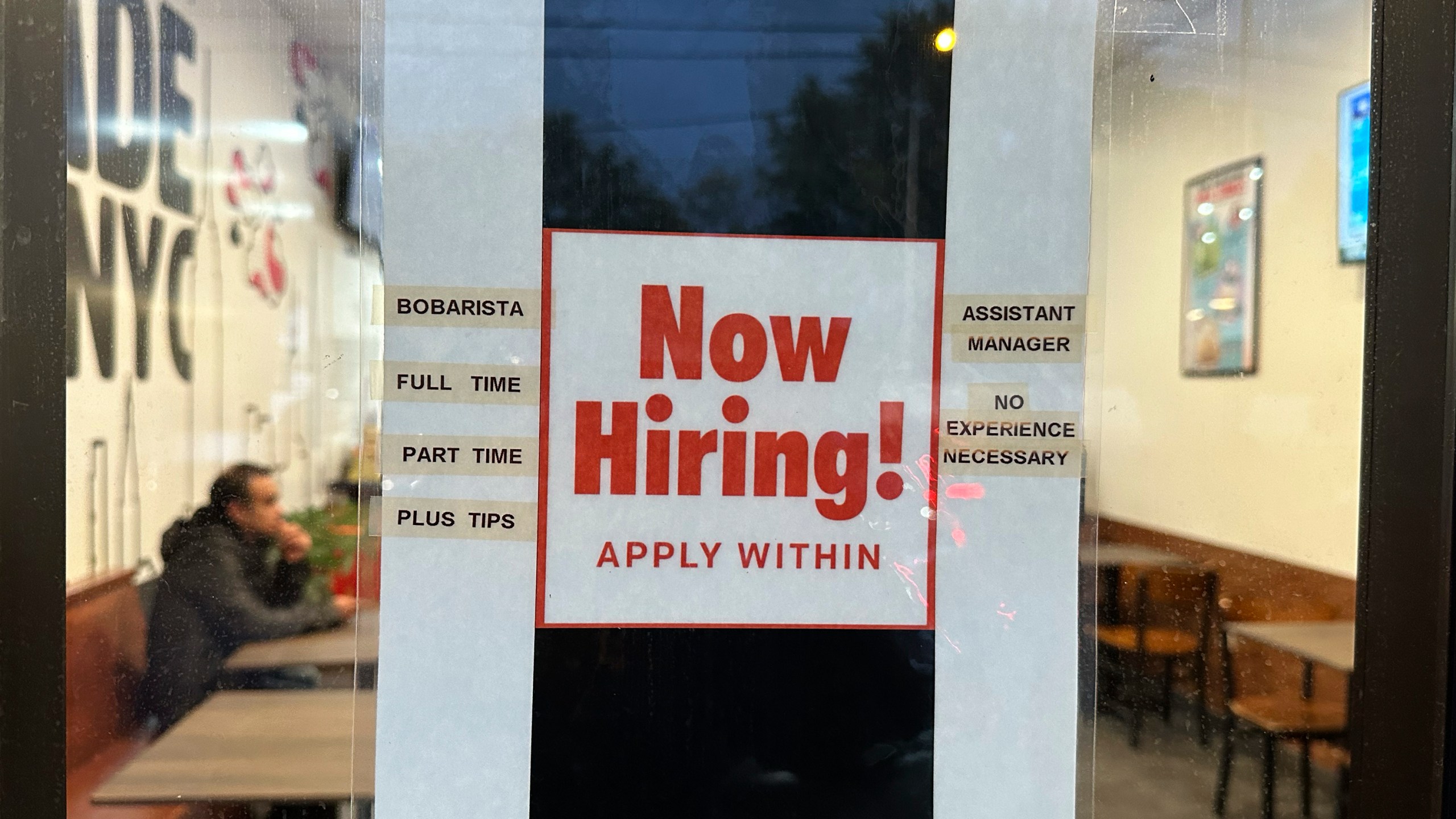 A hiring sign is displayed at a restaurant in Rolling Meadows, Ill., Tuesday, Oct. 10, 2023. On Thursday, the Labor Department reports on the number of people who applied for unemployment benefits last week. (AP Photo/Nam Y. Huh)