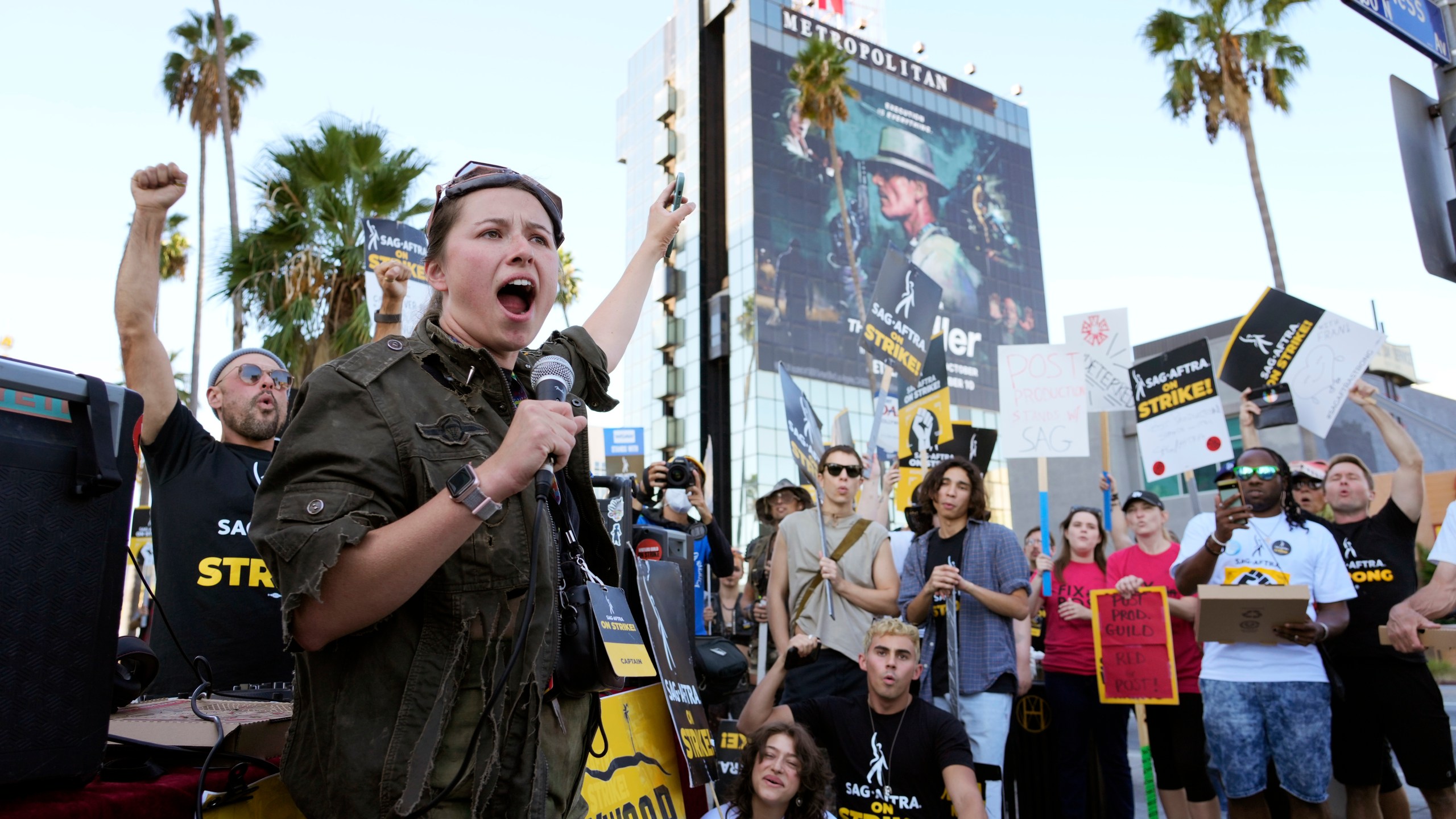 SAG-AFTRA captain Mary M. Flynn rallies fellow striking actors on a picket line outside Netflix studios, Wednesday, Nov. 8, 2023, in Los Angeles. (AP Photo/Chris Pizzello)