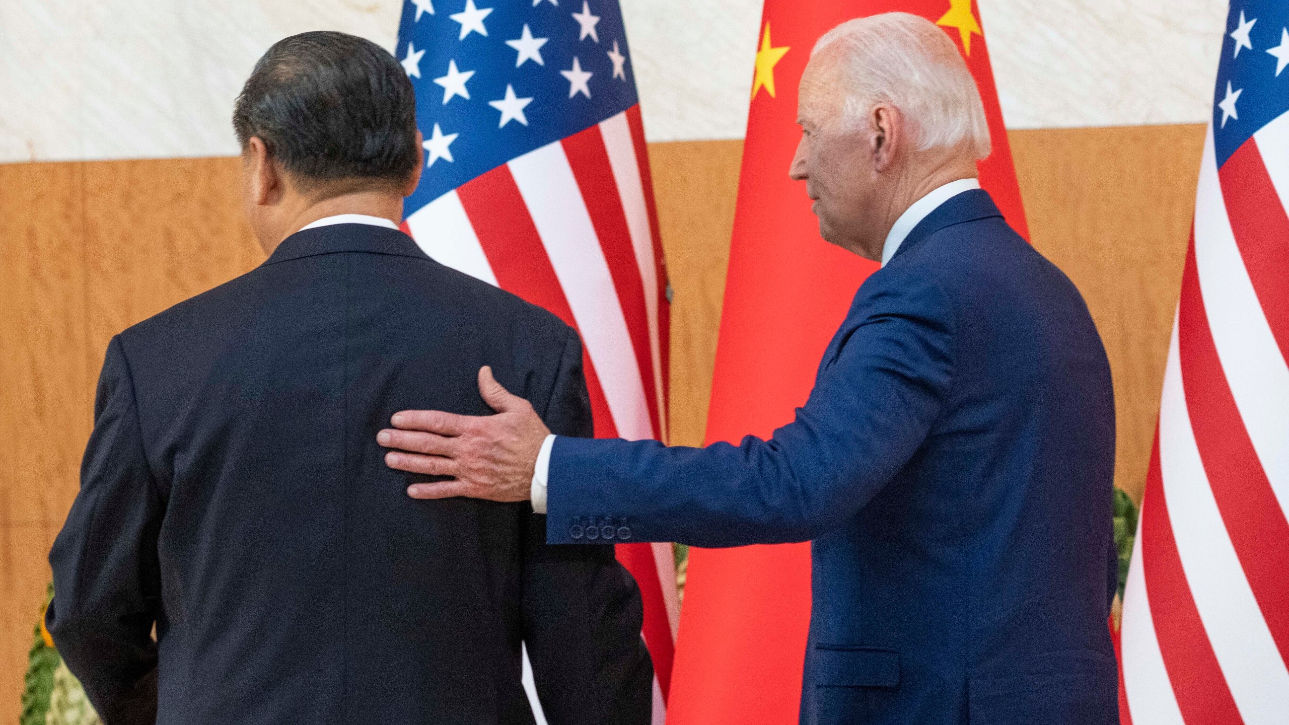 FILE - U.S. President Joe Biden, right, departs with Chinese President Xi Jinping for a meeting on the sidelines of the G20 summit meeting, Nov. 14, 2022, in Bali, Indonesia. (AP Photo/Alex Brandon, File)