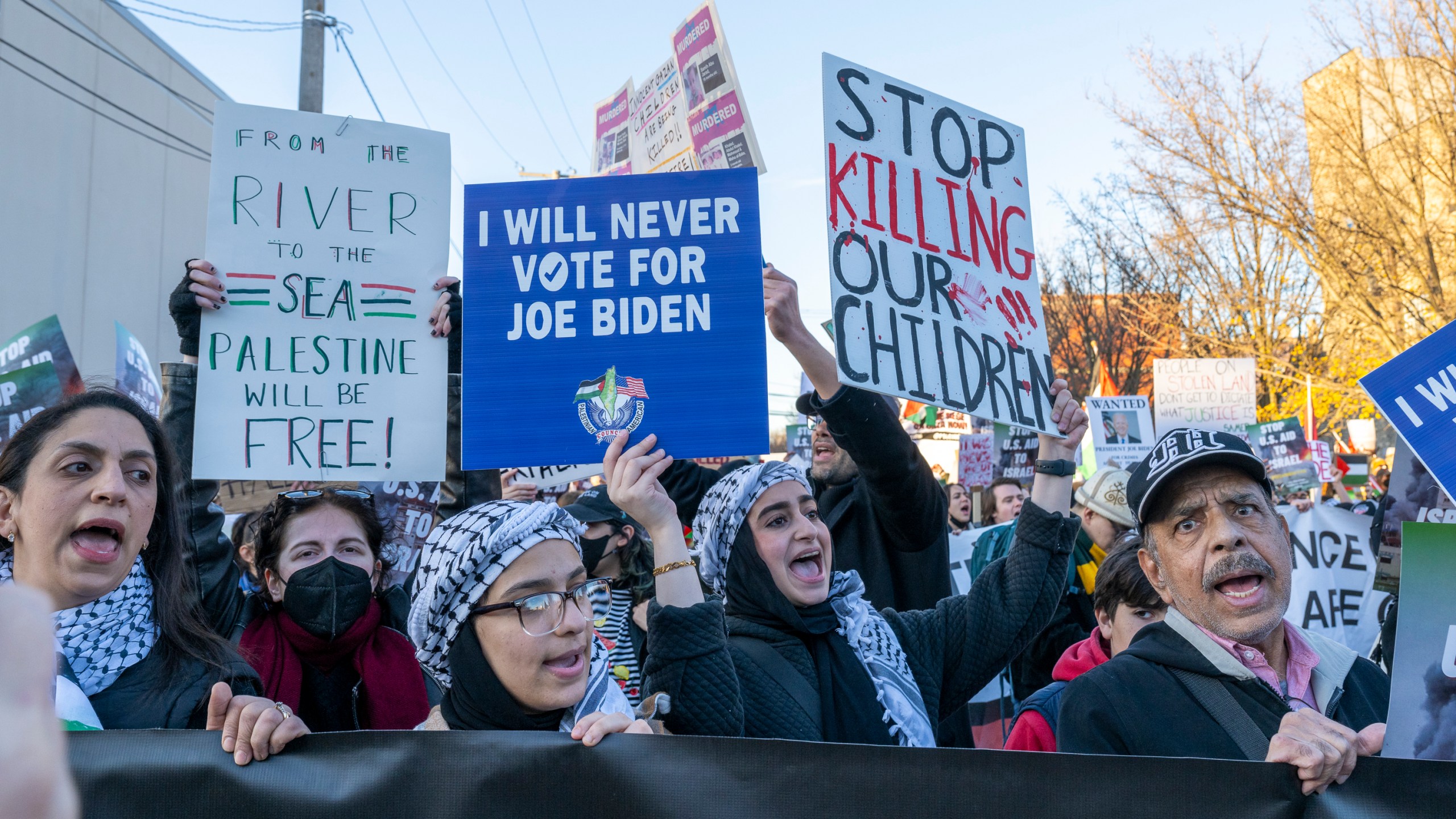 Around a thousand Palestinian and pro-Palestinian demonstrators rally at the corner of W. Hubbard St. and N. Armour St. near where President Joe Biden was attending a fundraising event in the West Town neighborhood of Chicago, Thursday, Nov. 9, 2023. Demonstrators were demanding that the President as well as national Democrats use their power to broker a ceasefire between Israel and Hamas whose conflict has killed thousands of civilians most of whom are Palestinian. (Tyler Pasciak LaRiviere/Chicago Sun-Times via AP)