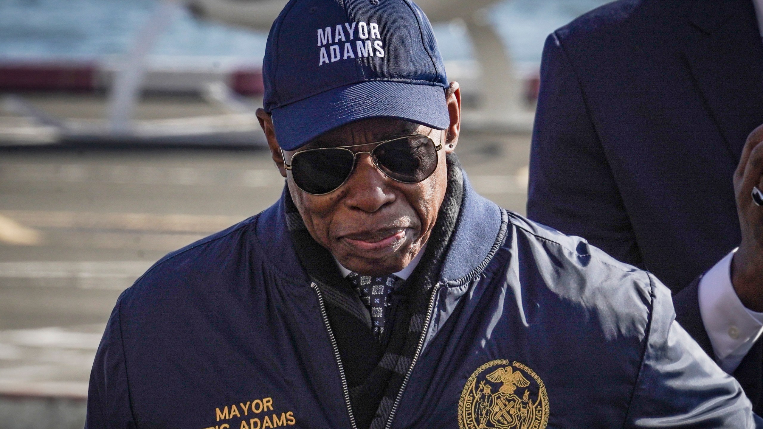 New York City Mayor Eric Adams leaves a news conference at Manhattan's downtown heliport, after announcing the city's support for electric vertical takeoff and landing aircraft, Monday, Nov. 13, 2023, in New York. (AP Photo/Bebeto Matthews)