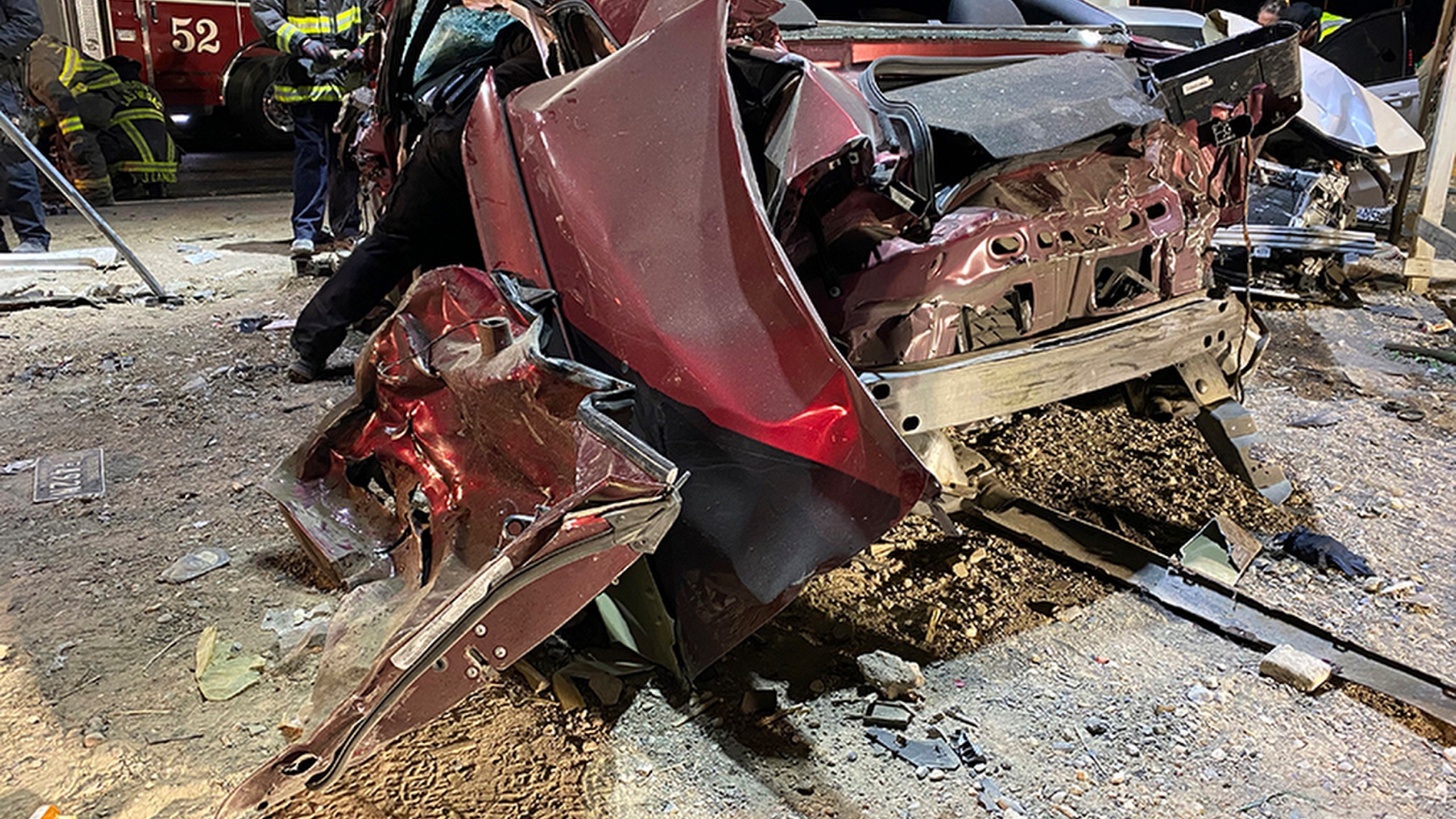 FILE - This photo released by the North Las Vegas Police Department shows a wrecked Dodge Challenger, Jan. 29, 2022, in North Las Vegas. The National Transportation Safety Board wants automakers to install systems on all new vehicles that warn drivers when they go over the speed limit, and it is asking safety regulators to figure out how states can electronically limit speeds on vehicles driven by repeat traffic offenders. NTSB's recommendations to combat excessive speeding came after a hearing Tuesday, Nov. 14, 2023, on the January 2022 crash in North Las Vegas. (North Las Vegas Police Department via AP, File)