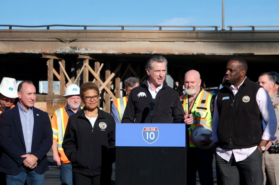 Gov. Gavin Newsom speaks at a press conference about repairs for a stretch of Interstate 10.