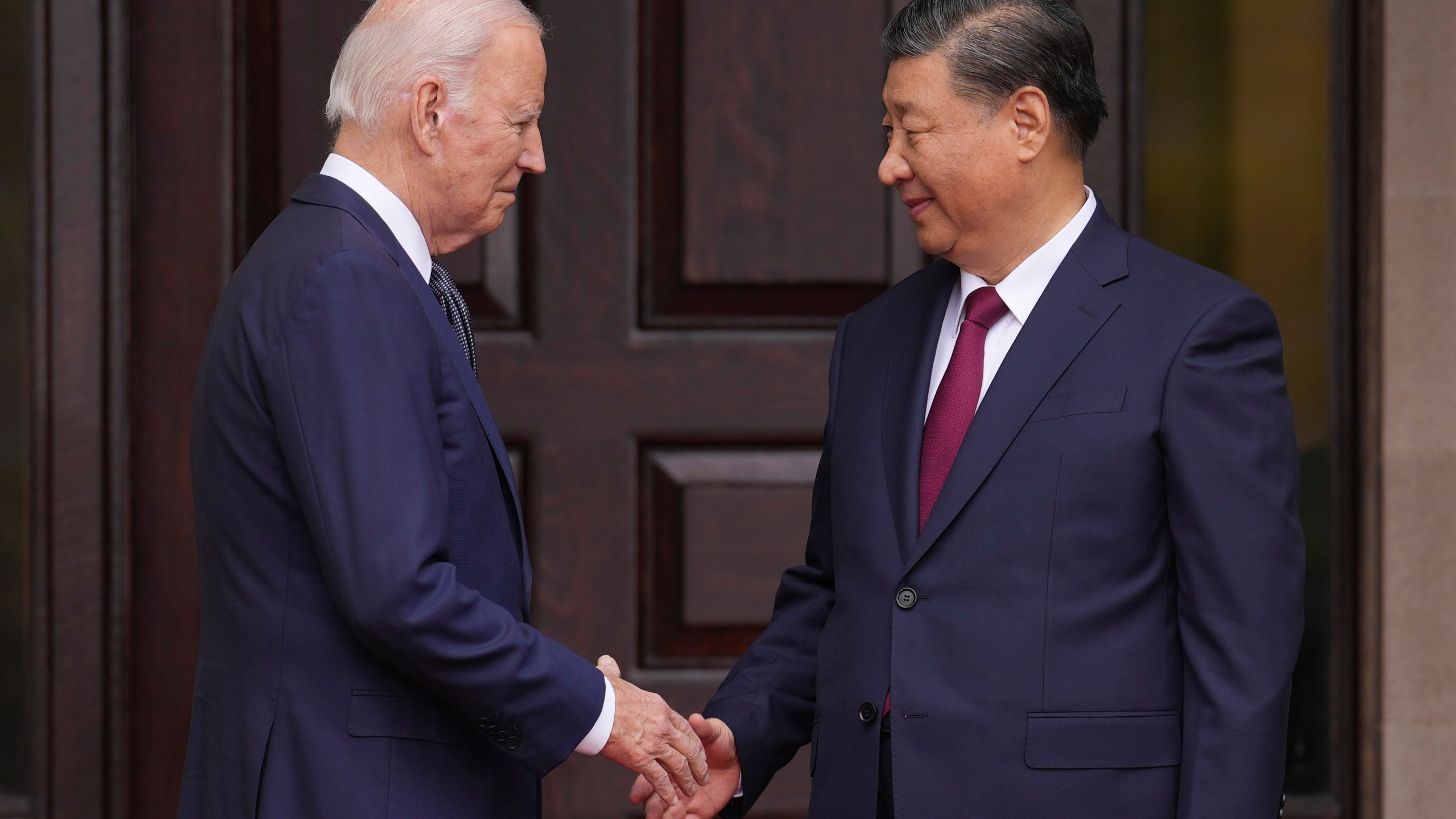 President Joe Biden greets China's President President Xi Jinping at the Filoli Estate in Woodside, Calif., Wednesday, Nov, 15, 2023, on the sidelines of the Asia-Pacific Economic Cooperative conference. (Doug Mills/The New York Times via AP, Pool)