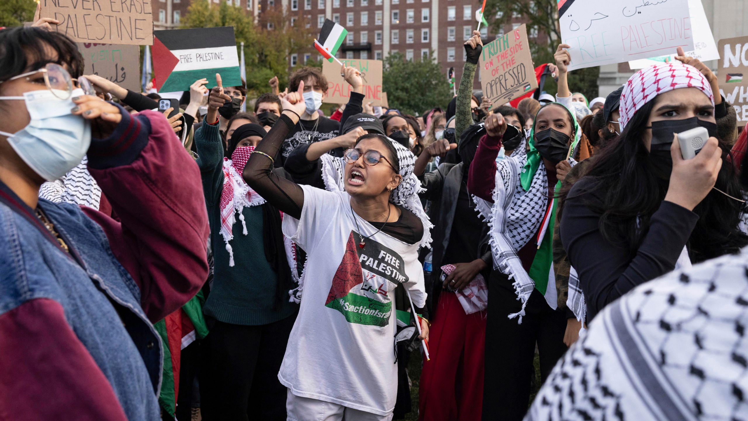 FIle- Palestinian supporters gather for a protest at Columbia University, Thursday, Oct. 12, 2023, in New York. As the Israel-Hamas war rages in Gaza, there's a bitter battle for public opinion flaring in the U.S., with angry rallies and disruptive protests at prominent venues in several major cities. Among the catalysts are Palestinian and Jewish-led groups that have been active for years in opposing Israeli policies toward the Palestinians. Now many groups involved in those earlier efforts are playing a key role protesting the latest fighting, with actions on campuses and beyond. (AP Photo/Yuki Iwamura, File)