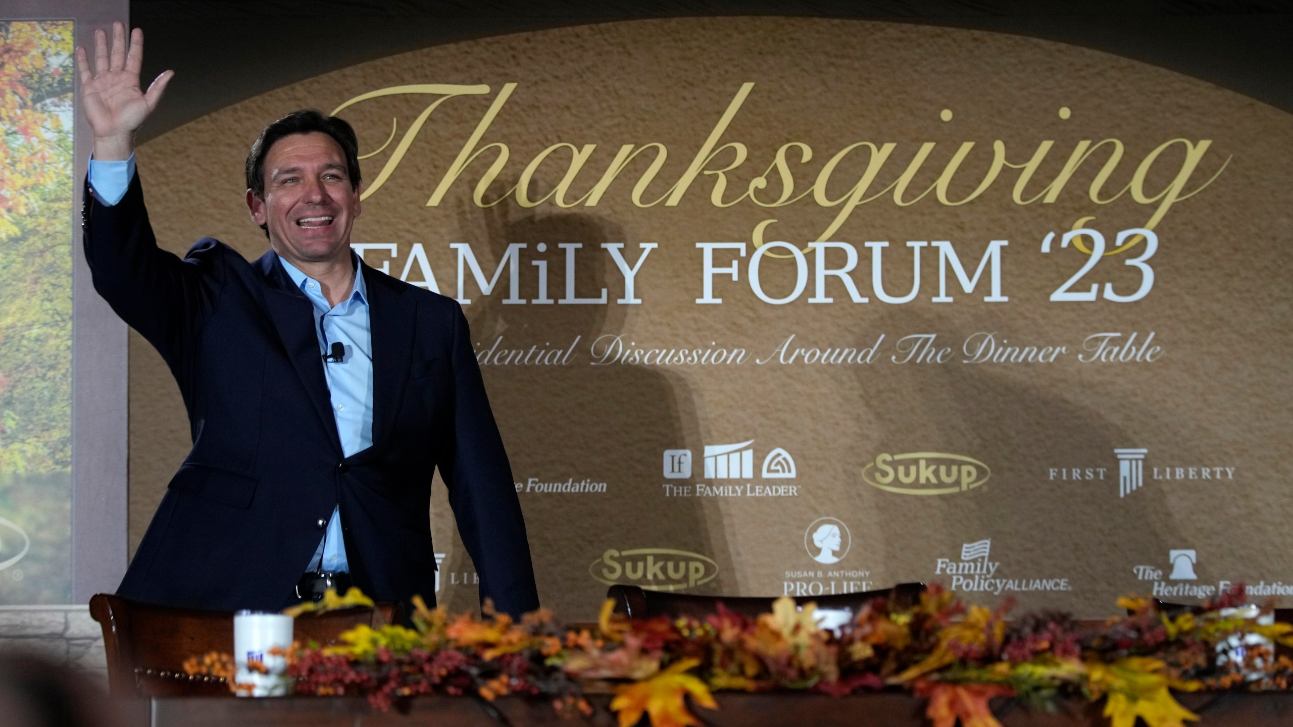 Republican presidential candidate Florida Gov. Ron DeSantis arrives at the Family Leader's Thanksgiving Family Forum, Friday, Nov. 17, 2023, in Des Moines, Iowa. (AP Photo/Charlie Neibergall)