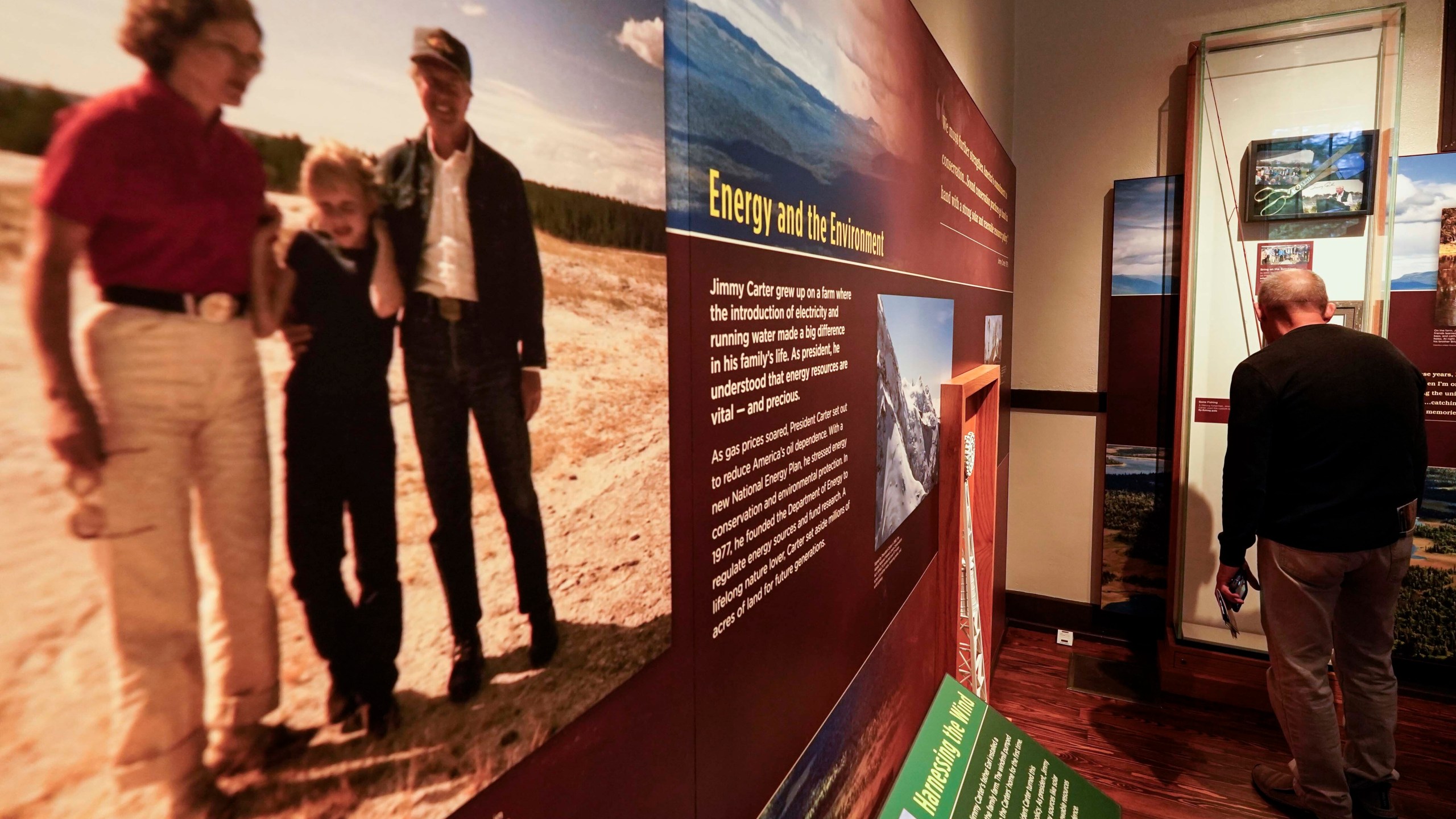 Dennison Doldolato, of Salt Lake City, Utah, looks at a display inside the Jimmy Carter National Historical Park, Monday, Nov. 20, 2023, in Plains, Ga. Rosalynn Carter, the closest adviser to Jimmy Carter during his one term as U.S. president and their four decades thereafter as global humanitarians, died Sunday, Nov. 19, 2023. She was 96. (AP Photo/Mike Stewart)