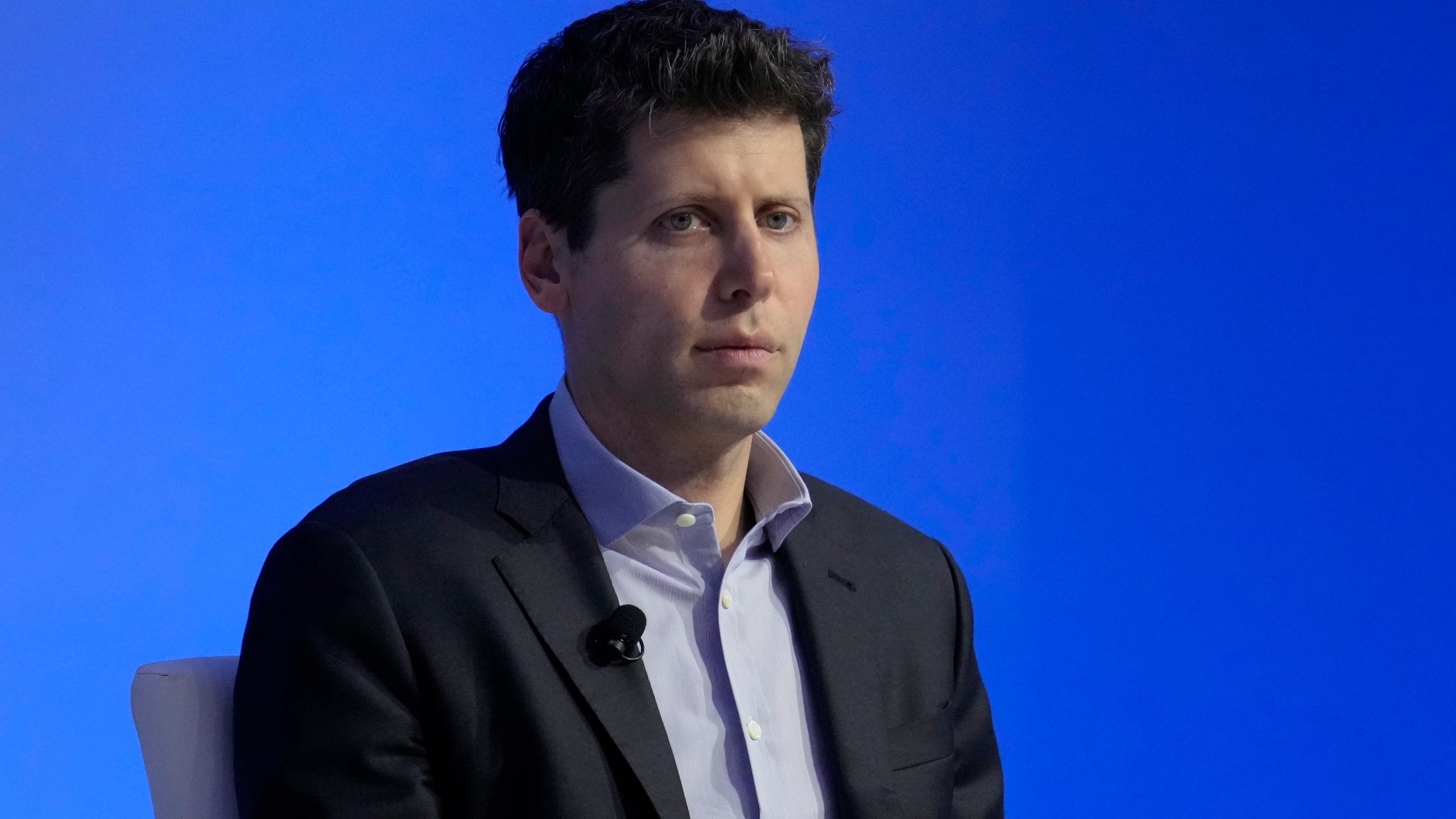 FILE - OpenAI CEO Sam Altman participates in a discussion during the Asia-Pacific Economic Cooperation (APEC) CEO Summit, Nov. 16, 2023, in San Francisco. Altman, the ousted leader of ChatGPT-maker OpenAI, is returning to the company that fired him late last week, the latest in a saga that has shocked the artificial intelligence industry. San Francisco-based OpenAI said in a statement late Tuesday, Nov. 21: “We have reached an agreement in principle for Sam Altman to return to OpenAI as CEO with a new initial board of Bret Taylor (Chair), Larry Summers, and Adam D’Angelo.” (AP Photo/Eric Risberg, File)