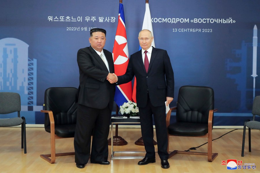 FILE - In this photo provided by the North Korean government, North Korean leader Kim Jong Un, left, and Russian President Vladimir Putin shake hands before their talk at the Vostochny cosmodrome outside the city of Tsiolkovsky, about 200 kilometers (125 miles) from the city of Blagoveshchensk in the far eastern Amur region, Russia, Wednesday, Sept. 13, 2023. Independent journalists were not given access to cover the event depicted in this image distributed by the North Korean government. The content of this image is as provided and cannot be independently verified. Korean language watermark on image as provided by source reads: "KCNA" which is the abbreviation for Korean Central News Agency. (Korean Central News Agency/Korea News Service via AP, File)