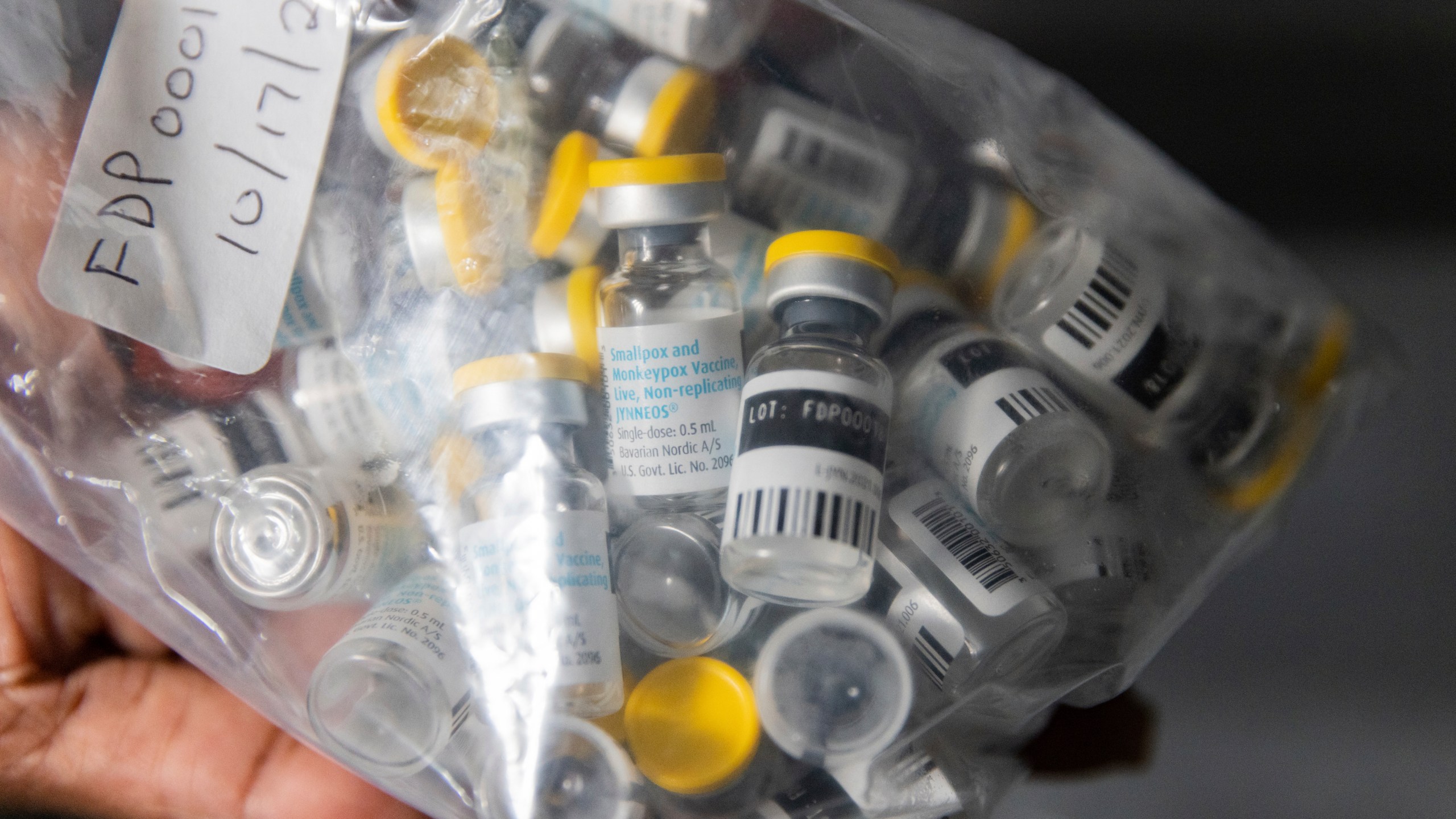 FILE - Vials of single doses of the Jynneos vaccine for monkeypox are seen from a cooler at a vaccinations site on Aug. 29, 2022, in the Brooklyn borough of New York. The World Health Organization said it has confirmed sexual transmission of mpox in Congo for the first time during the country's biggest-ever outbreak, in a worrying development African scientists warn could make it more difficult to stop the disease. (AP Photo/Jeenah Moon, File)