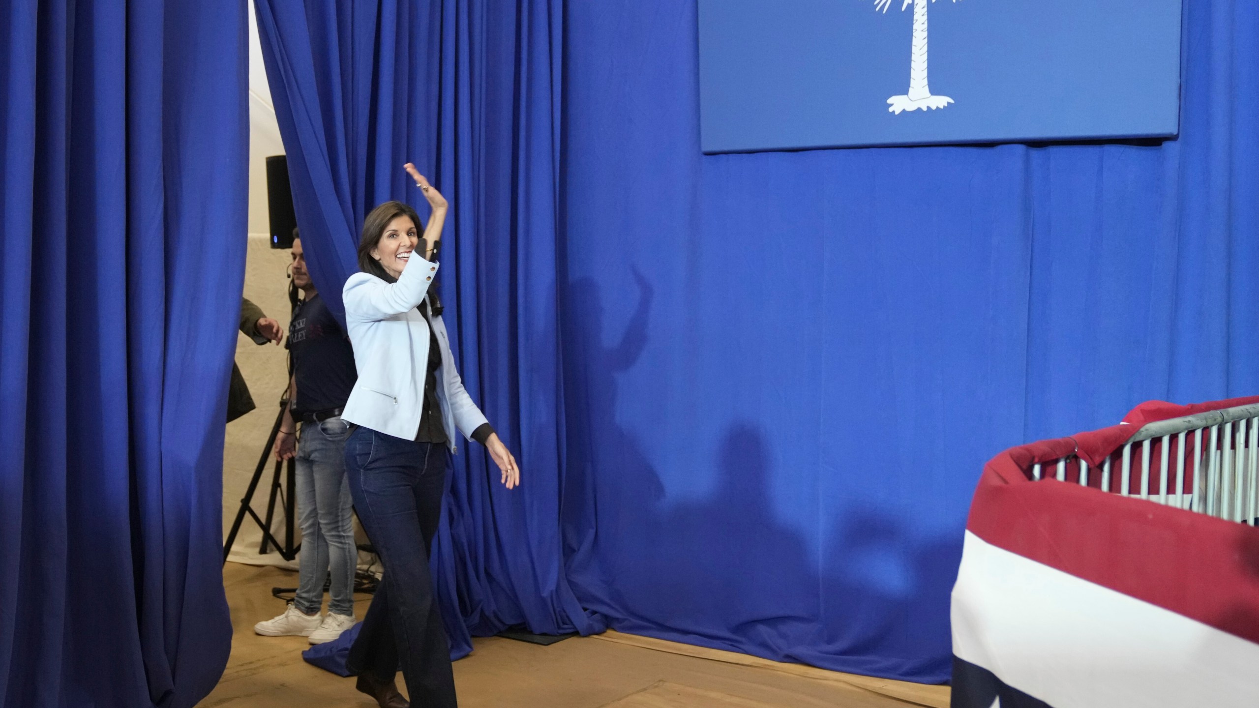 GOP presidential hopeful Nikki Haley waves as she enters a campaign event on Monday, Nov. 27, 2023, in Bluffton, S.C. Haley is among a cluster of Republican candidates competing for second place in a GOP Republican primary thus far largely dominated by former President Donald Trump. (AP Photo/Meg Kinnard)