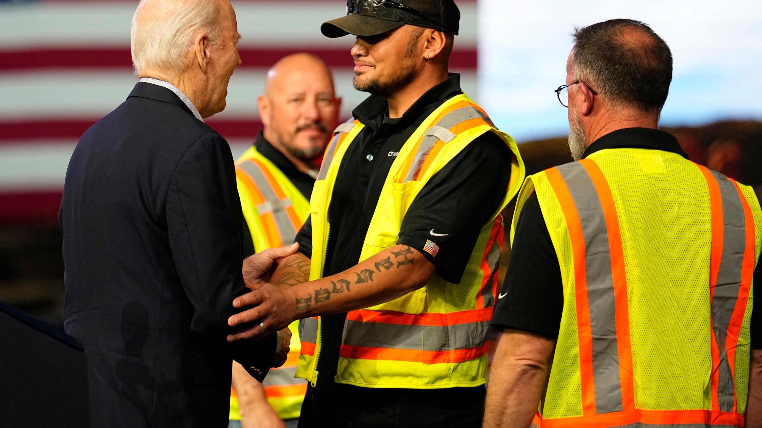 President Joe Biden greets workers after speaking at CS Wind, Wednesday, Nov. 29, 2023, in Pueblo, Colo. (AP Photo/Jack Dempsey)