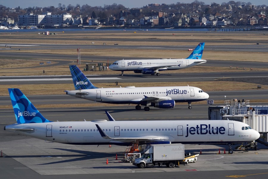 FILE - Passenger jets on the tarmac at Logan International Airport, Jan. 11, 2023, in Boston. The Federal Aviation Administration said Thursday, Nov. 30, 2023, they will propose requiring that new planes be capable of recording 25 hours of sounds in the cockpit, up from the current two hours, to prevent valuable information from being lost after close calls. (AP Photo/Steven Senne, File)