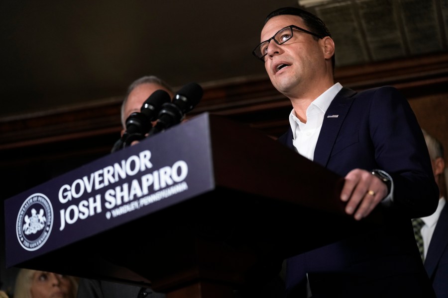 Pennsylvania Gov. Josh Shapiro speaks with members of the media.