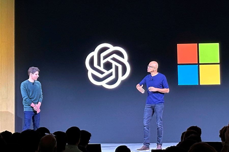 File - OpenAI CEO Sam Altman, left, appears onstage with Microsoft CEO Satya Nadella at OpenAI's first developer conference, on Nov. 6, 2023, in San Francisco. Negotiators will meet this week to hammer out details of European Union artificial intelligence rules but the process has been bogged down by a simmering last-minute battle over how to govern systems that underpin general purpose AI services like OpenAI's ChatGPT and Google's Bard chatbot. (AP Photo/Barbara Ortutay, File)