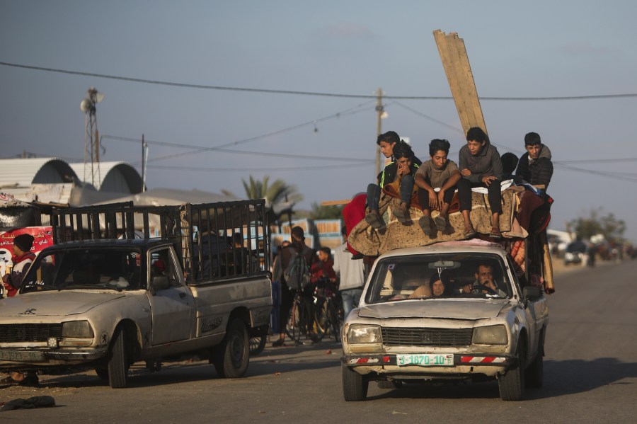 Palestinians flee the Israeli ground offensive in Khan Younis, Gaza Strip, Wednesday, Dec. 6, 2023. (AP Photo/Mohammed Dahman)