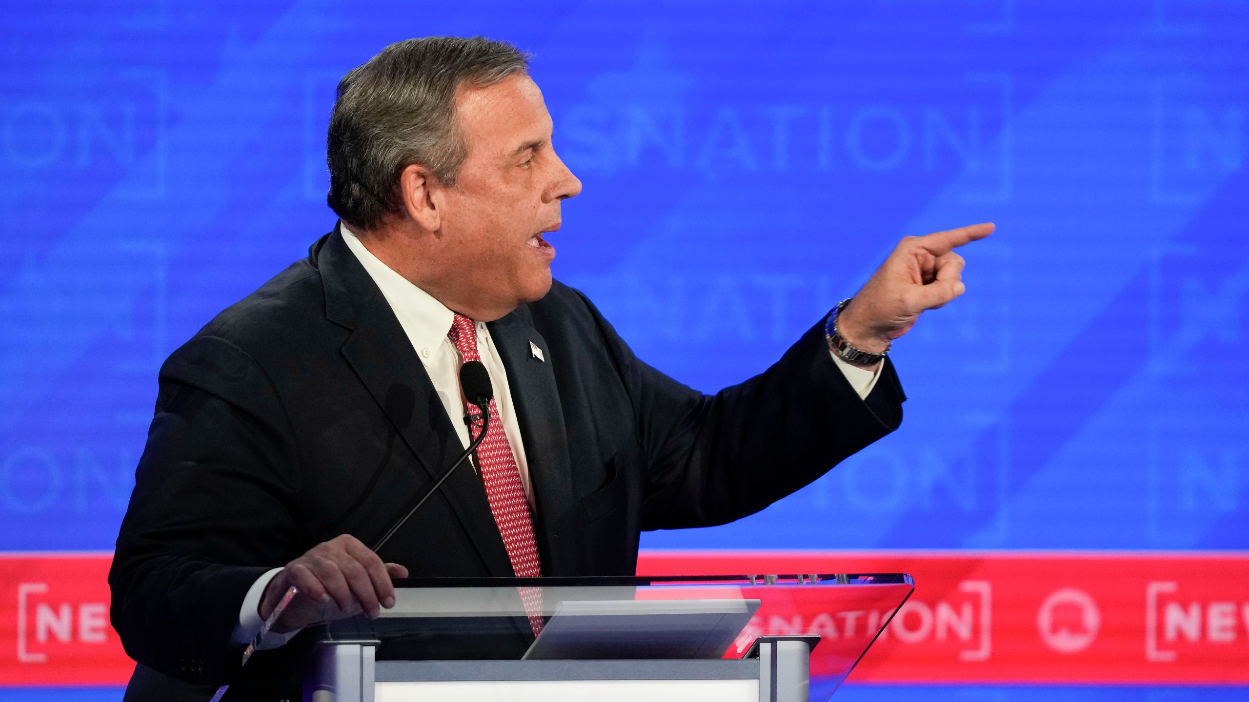 Republican presidential candidate former New Jersey Gov. Chris Christie, gesturing towards businessman Vivek Ramaswamy during a Republican presidential primary debate hosted by NewsNation on Wednesday, Dec. 6, 2023, at the Moody Music Hall at the University of Alabama in Tuscaloosa, Ala. (AP Photo/Gerald Herbert)