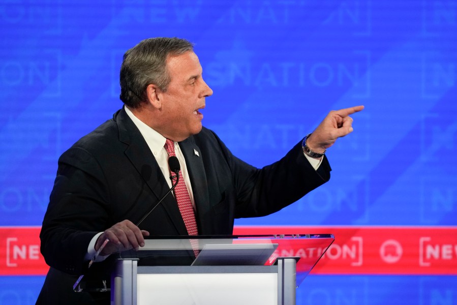 Republican presidential candidate former New Jersey Gov. Chris Christie, gesturing towards businessman Vivek Ramaswamy during a Republican presidential primary debate hosted by NewsNation on Wednesday, Dec. 6, 2023, at the Moody Music Hall at the University of Alabama in Tuscaloosa, Ala. (AP Photo/Gerald Herbert)