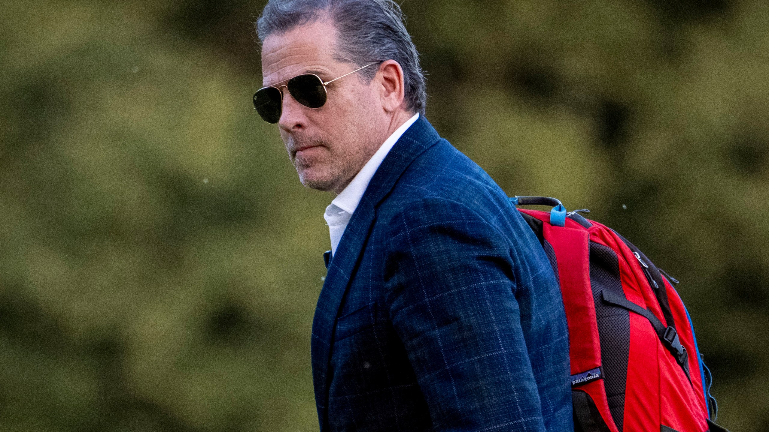 FILE - Hunter Biden, the son of President Joe Biden, walks from Marine One upon arrival at Fort McNair, June 25, 2023, in Washington. Hunter Biden has been indicted on nine tax charges in California as a special counsel investigation into the business dealings of the president's son intensifies against the backdrop of the looming 2024 election.(AP Photo/Andrew Harnik, File)