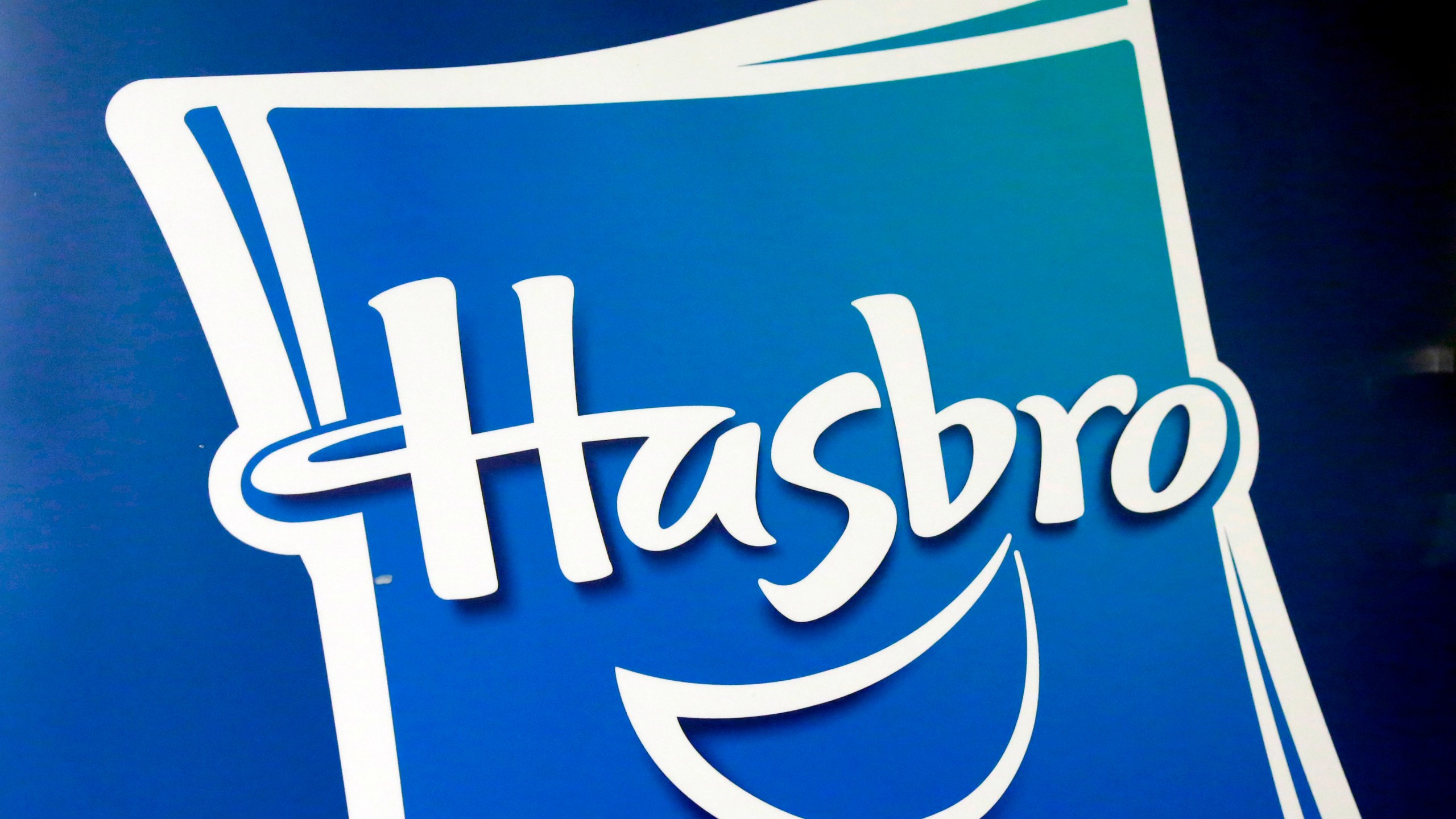 FILE - The Hasbro logo is seen, April 26, 2018, in New York. Toy maker Hasbro said Monday, Dec. 11, 2023, that it is cutting about 1,100 jobs, or 20% of its workforce, as the malaise in the toy business extends through another holiday shopping season. (AP Photo/Richard Drew, File)