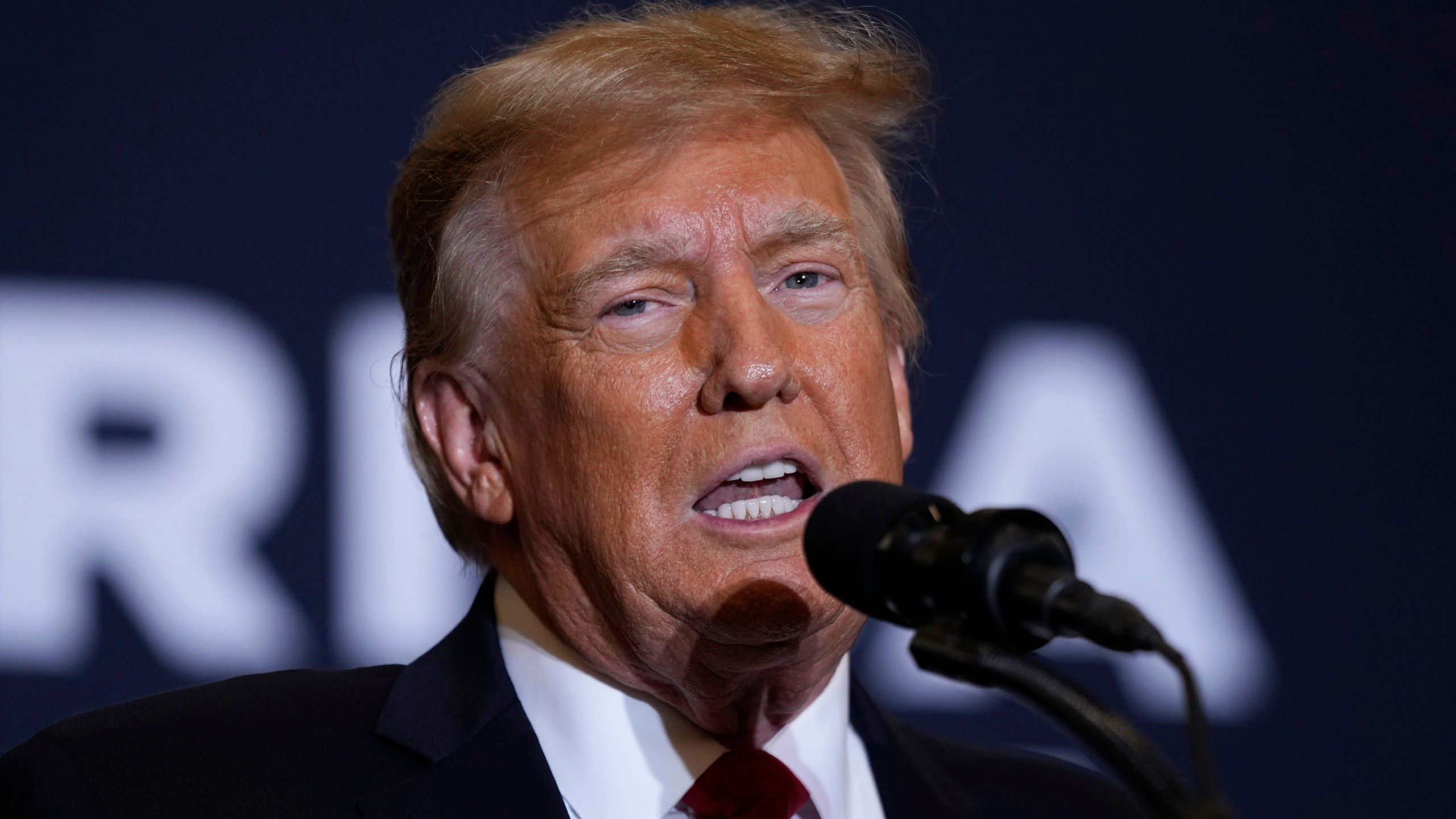 Former President Donald Trump speaks during a commit to caucus rally, Wednesday, Dec. 13, 2023, in Coralville, Iowa. (AP Photo/Charlie Neibergall)