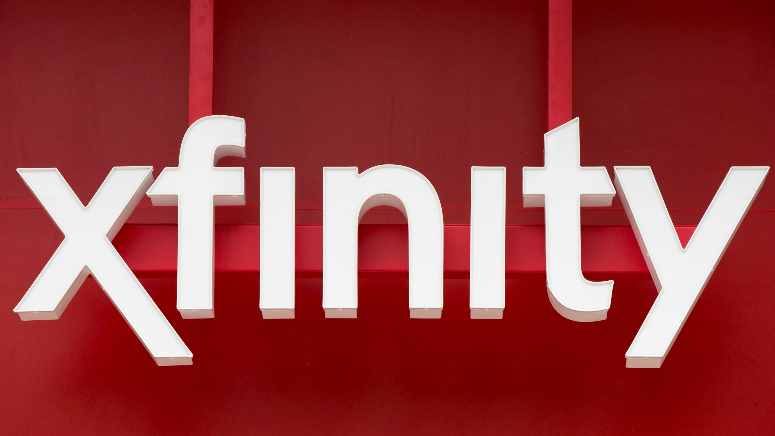 FILE - Signage for Xfinity, the cable division of Comcast, is displayed in Philadelphia, July 15, 2015. Hackers accessed Xfinity customers’ personal information by exploiting a vulnerability in software used by the company, the Comcast-owned telecommunications business announced this week. In a Monday, Dec. 18, 2023, notice to customers, Xfinity said there was unauthorized access to internal systems as a result of this vulnerability — which was previously announced by software provider Citrix — between Oct. 16 and 19. (AP Photo/Matt Rourke, File)