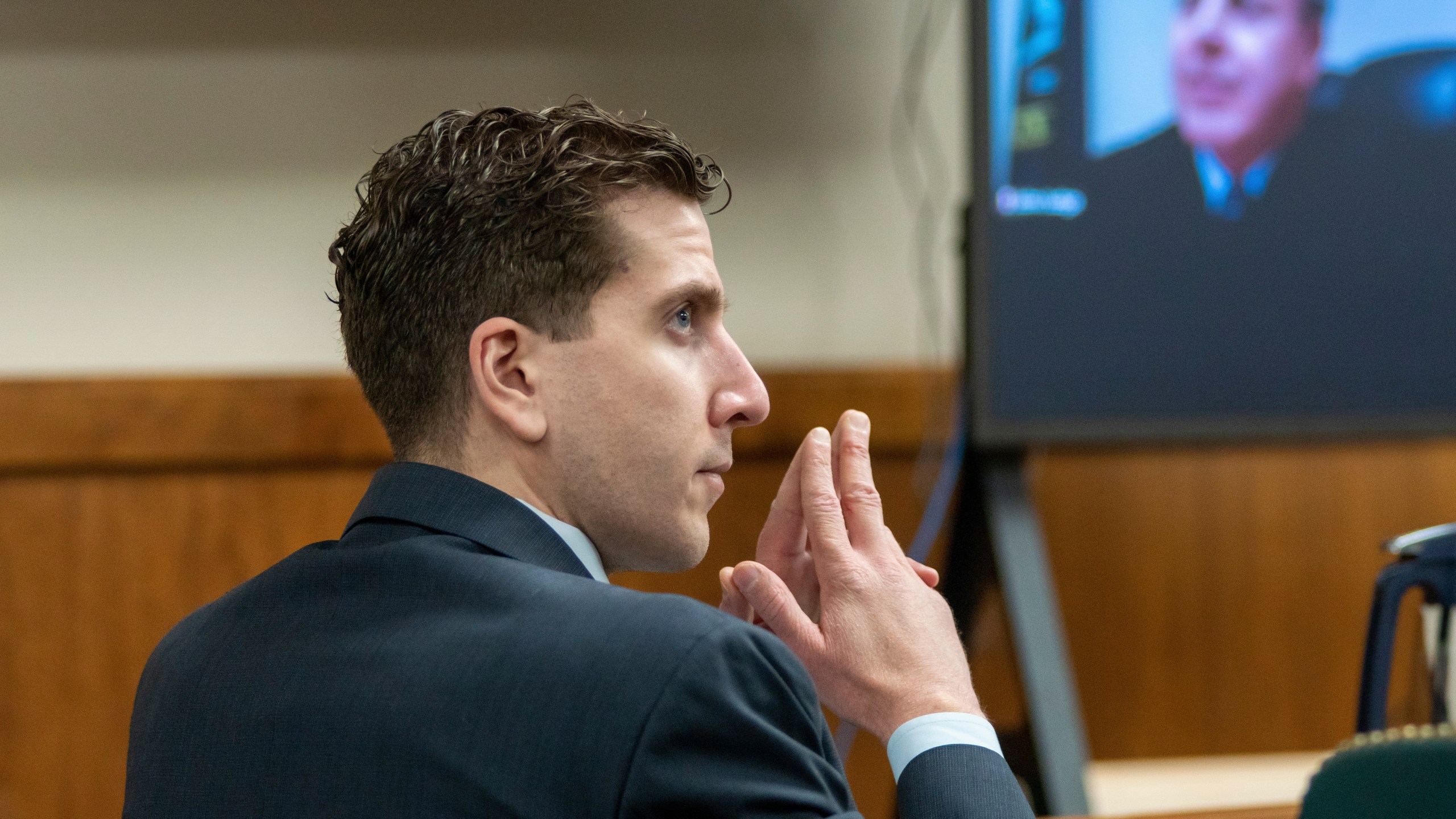 FILE - Bryan Kohberger listens to arguments during a hearing, Oct. 26, 2023, in Moscow, Idaho. Late Friday, Dec. 15, a judge ruled that the grand jury indictment of Kohberger, who is charged with killing four University of Idaho students, was conducted properly and will stand. (Kai Eiselein/New York Post via AP, Pool, File)