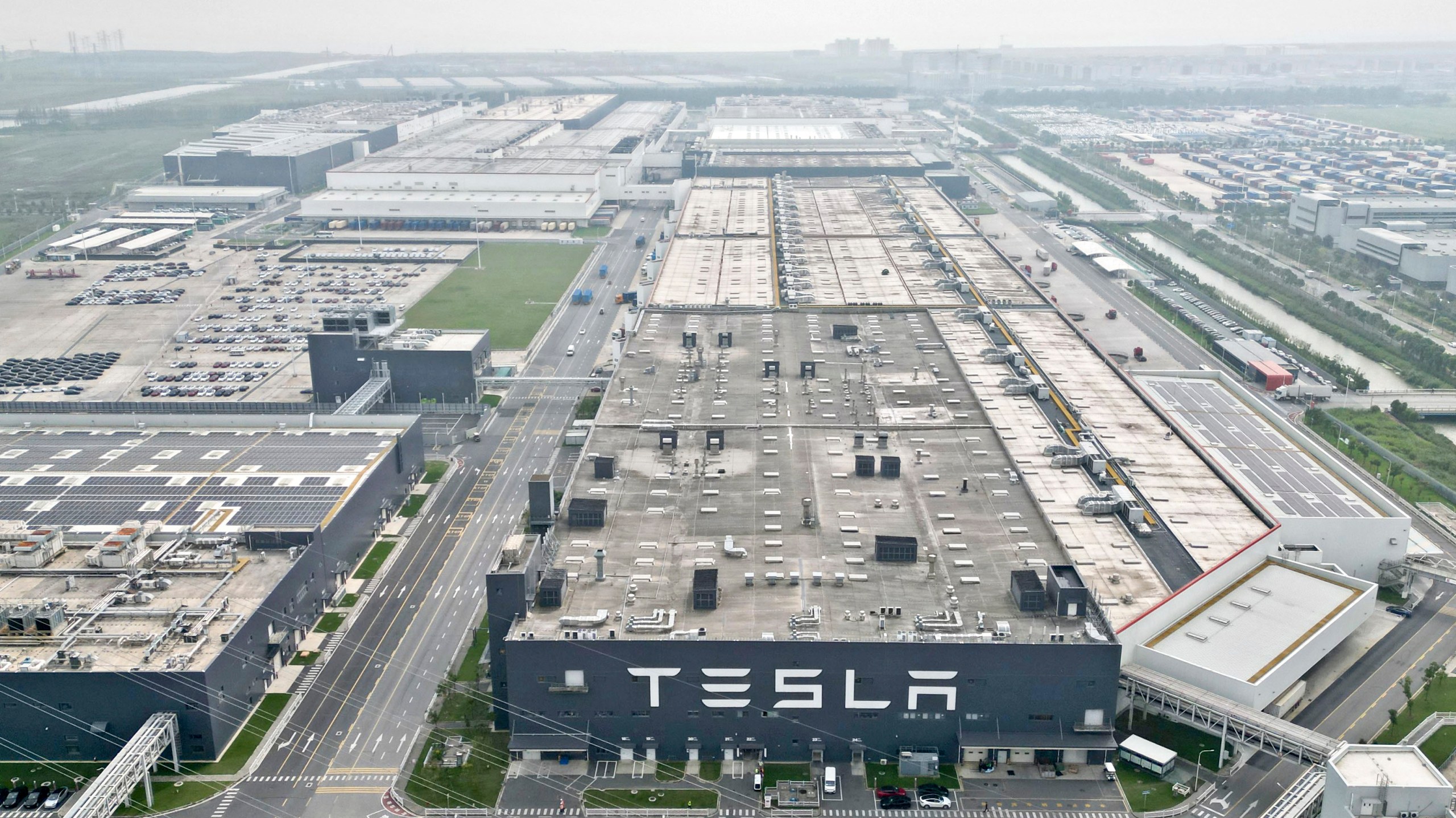 In this a photo released by Xinhua News Agency, the Tesla Gigafactory in Lingang new area of the China (Shanghai) Pilot Free Trade Zone is seen in east China's Shanghai on Sept. 26, 2023. American electric automaker Tesla's plans to produce energy-storage batteries in China moved forward on Friday, Dec. 22, 2023, with a signing ceremony for the land acquisition in Shanghai, China's state media said. (Liu Ying/Xinhua via AP, File)