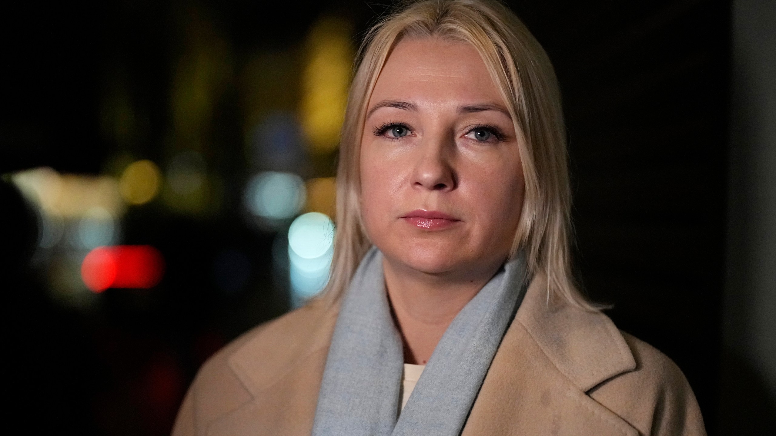 Yekaterina Duntsova looks on after submitting her documents as a presidential candidate for the upcoming presidential election to Russia's Central Election Committee, in Moscow, Russia, Wednesday, Dec. 20, 2023. Duntsova is a journalist-turned-grassroots campaigner and local legislator. She secured a nomination from a group of more than 500 supporters as required by Russian electoral law from those not running on a party ticket. Delegates from Russia’s ruling party unanimously backed President Vladimir Putin’s bid for reelection at a party conference in Moscow on Sunday. (AP Photo/Alexander Zemlianichenko)