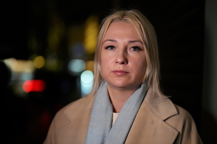 Yekaterina Duntsova looks on after submitting her documents as a presidential candidate for the upcoming presidential election to Russia's Central Election Committee, in Moscow, Russia, Wednesday, Dec. 20, 2023. Duntsova is a journalist-turned-grassroots campaigner and local legislator. She secured a nomination from a group of more than 500 supporters as required by Russian electoral law from those not running on a party ticket. Delegates from Russia’s ruling party unanimously backed President Vladimir Putin’s bid for reelection at a party conference in Moscow on Sunday. (AP Photo/Alexander Zemlianichenko)