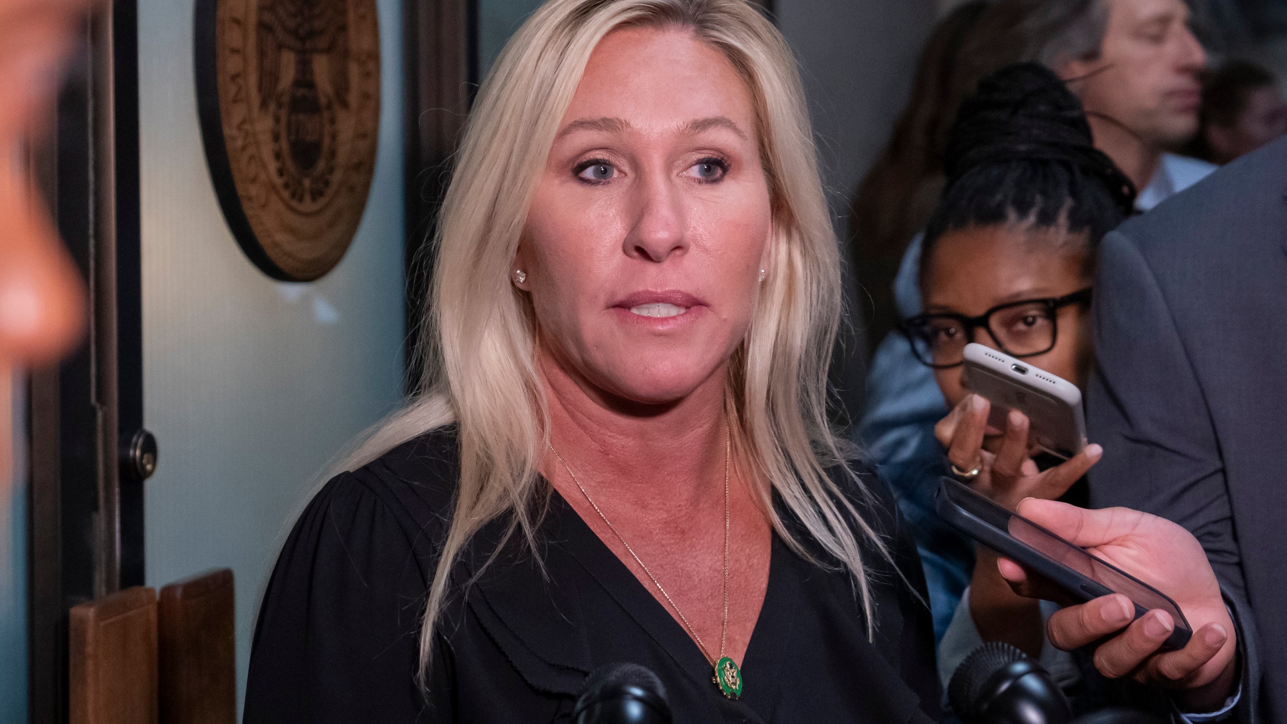 FILE - Rep. Marjorie Taylor-Greene, R-Ga., arrives on Capitol Hill, Oct. 24, 2023, in Washington. Greene was the target of a swatting attempt at her Georgia residence on Christmas morning, Monday, Dec. 25, the congresswoman and local police said, marking the latest instance of someone calling in a fake emergency to draw armed officers to her home. (AP Photo/Alex Brandon, File)